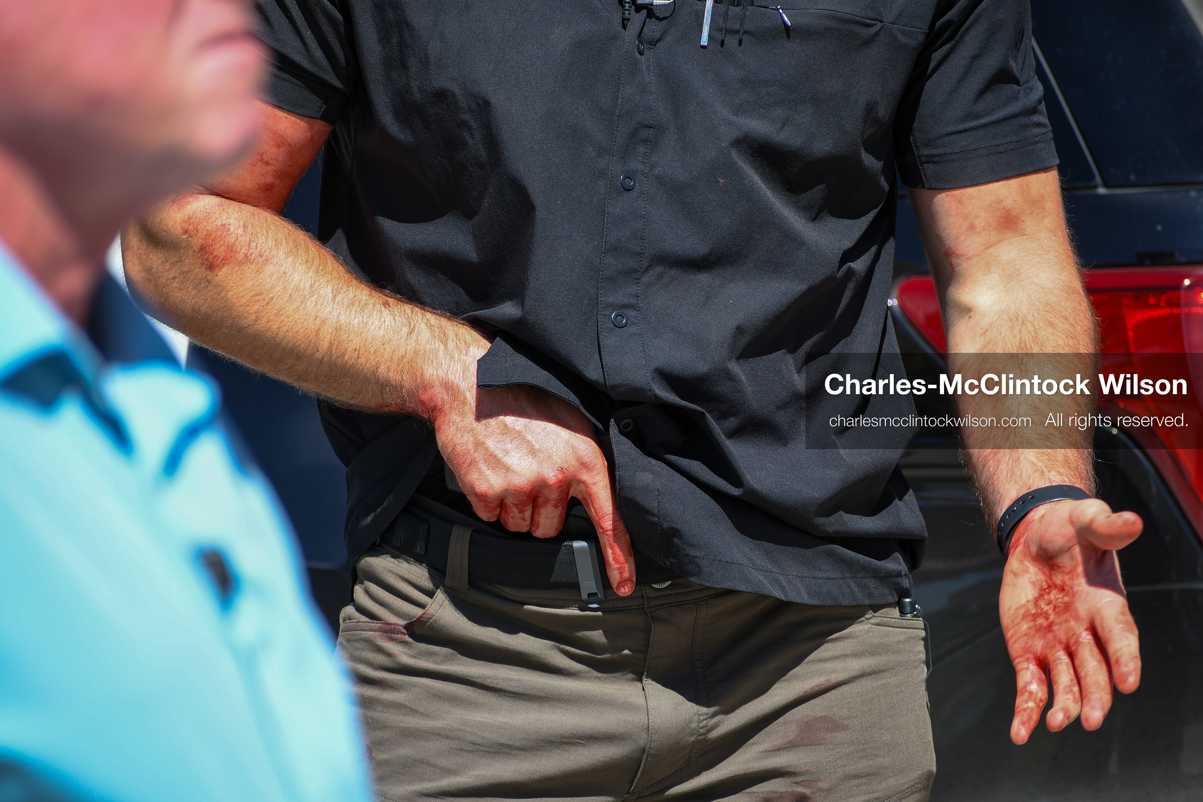 September 10, 2025, Orem, Utah, USA: A law enforcment officer with blood on his hands after a suspect is arrested in the shooting of right-wing pundit Charlie Kirk, the CEO and co-founder of the conservative youth organization Turning Point USA, Wednesday during an event at Utah Valley University. (Credit Image: © Charles-McClintock Wilson/ZUMA Press Wire)