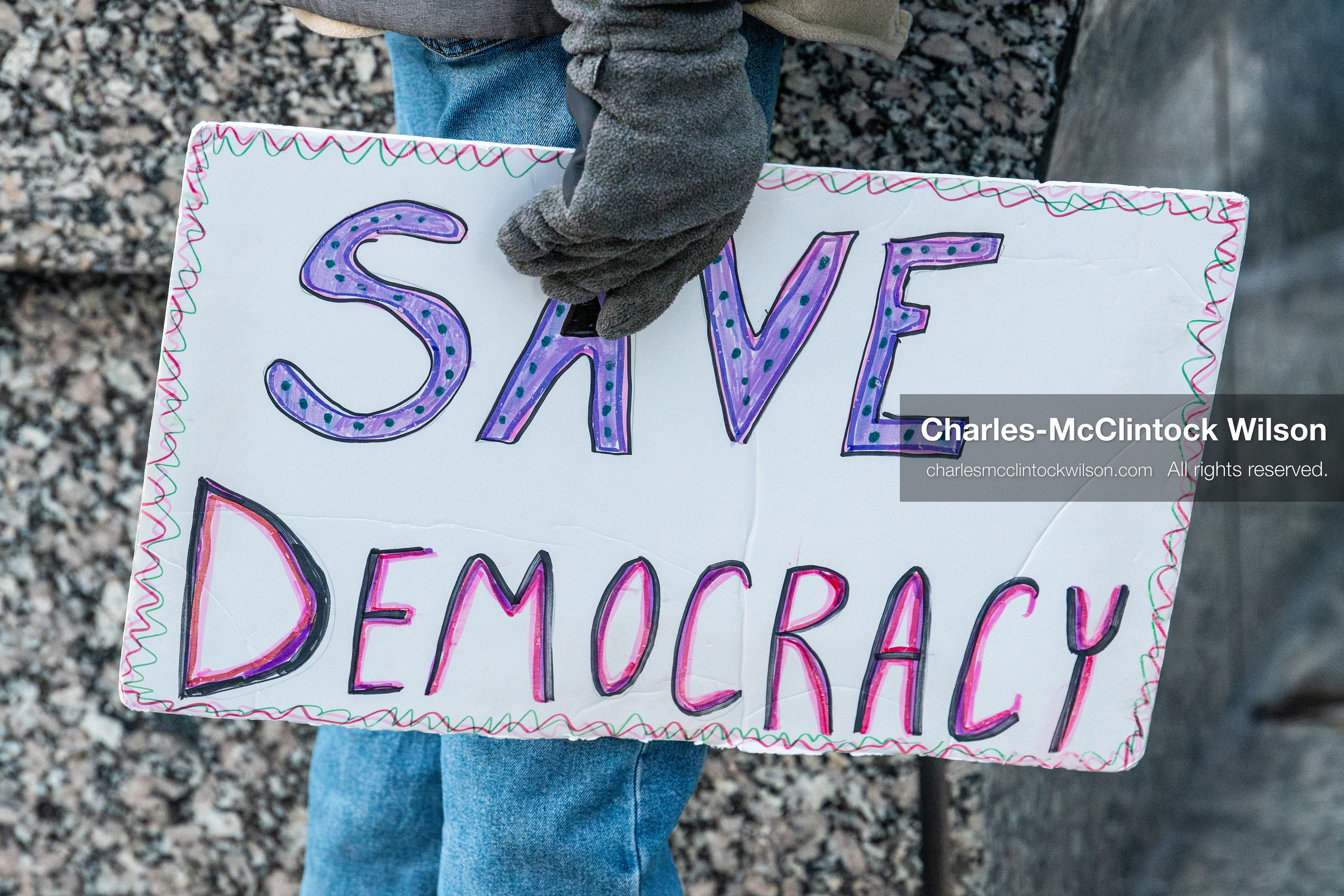 January 5, 2026, Salt Lake City, Utah, USA: A demonstrator holds a sign during a protest outside the Wallace Federal Building in Salt Lake City, Utah. The rally, organized by Salt Lake Indivisible, called for congressional limits on presidential war powers following recent US military actions in Venezuela involving the government of Nicolas Maduro. (Credit Image: (c) Charles‑McClintock Wilson/ZUMA Press Wire)