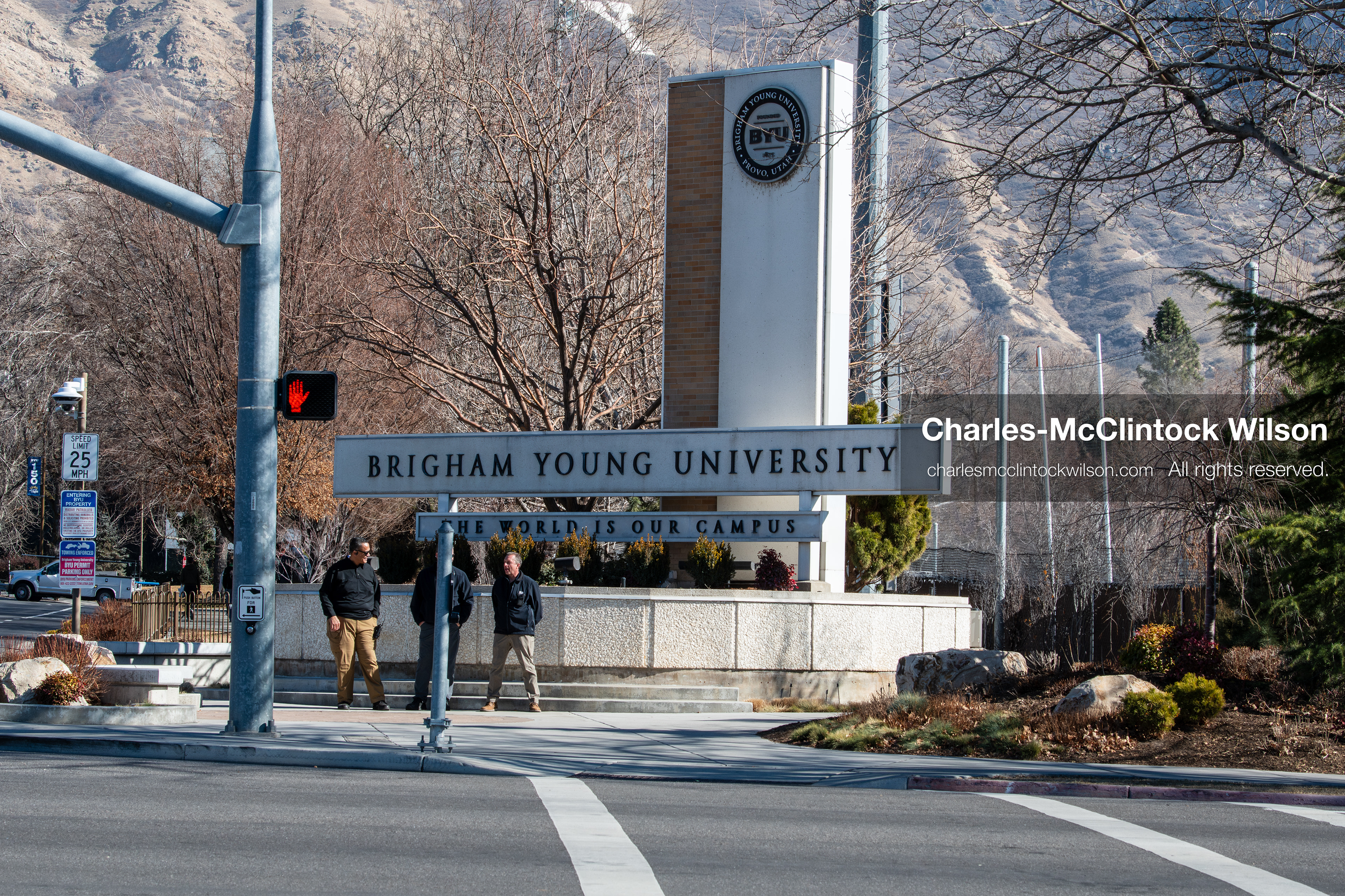 February 5, 2026, Provo, Utah, USA: People stand near an entrance sign at Brigham Young University in Provo during a protest opposing the presence of US Customs and Border Protection recruiters at a career fair held at the university. (Credit Image: © Charles McClintock Wilson/ZUMA Press Wire)