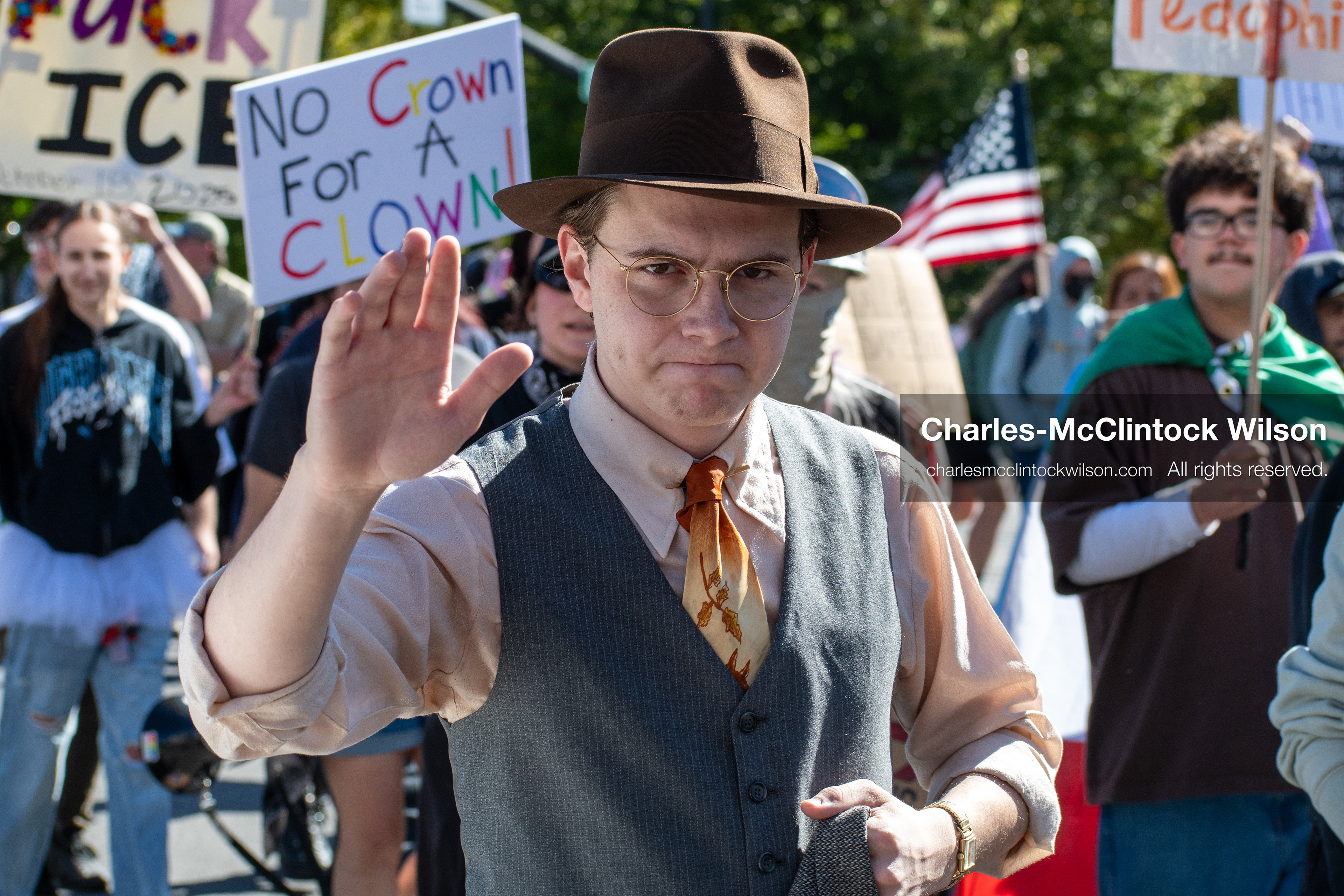 October 18, 2025, Salt Lake City, Utah, USA: A demonstrator gestures during a "No Kings" protest in Salt Lake City, Utah. Signs and flags were visible throughout the crowd as part of the nationwide mobilization.