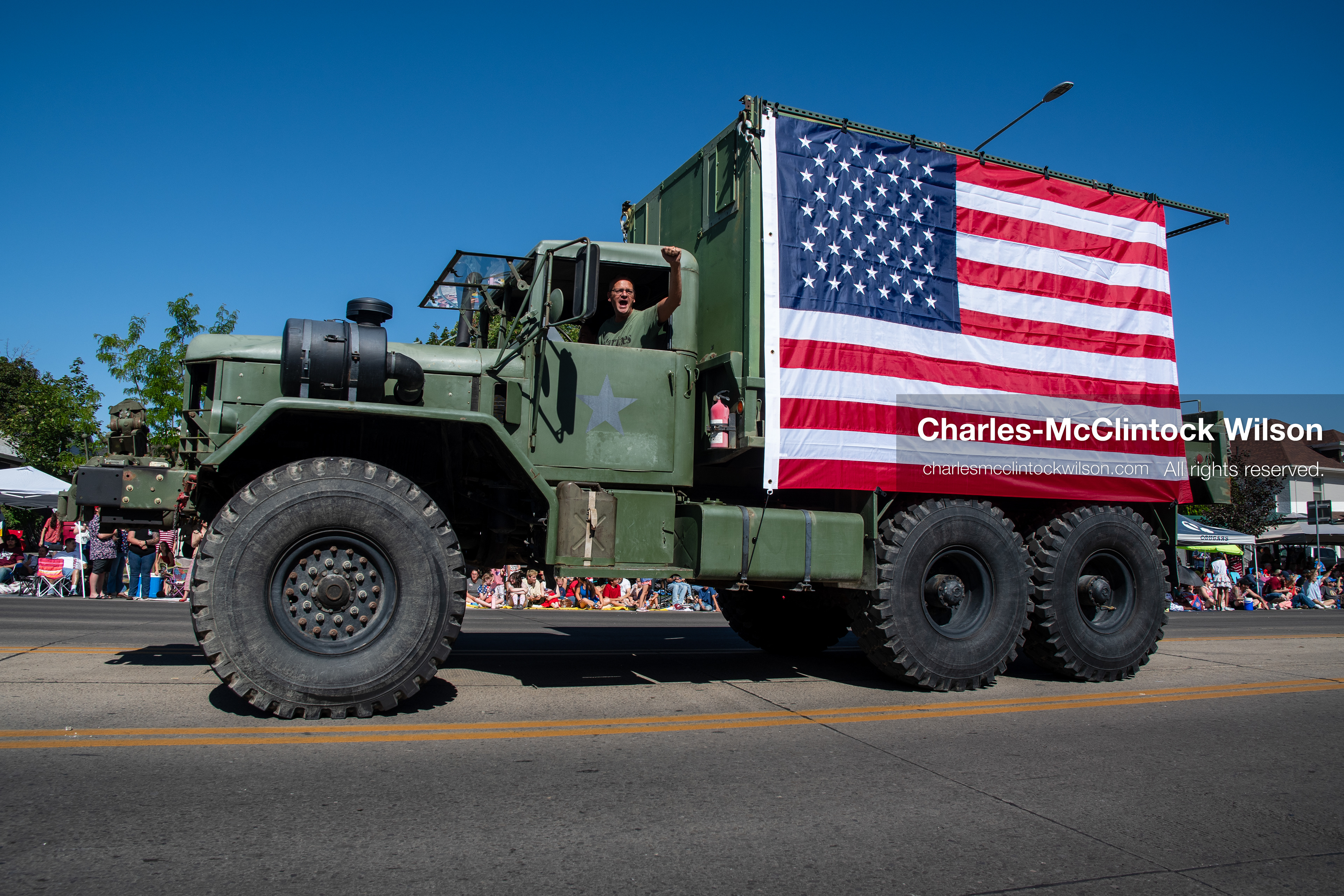 July 4, 2026, Provo, Utah, USA: A vintage military cargo truck draped with a large American flag drives along the route during America's Freedom Festival Grand Parade in Provo, Utah, Saturday, July 4, 2026. The annual Independence Day event features expanded programming to honor the 250th anniversary of United States independence. (Credit Image: © Charles-McClintock Wilson/ZUMA Press Wire)