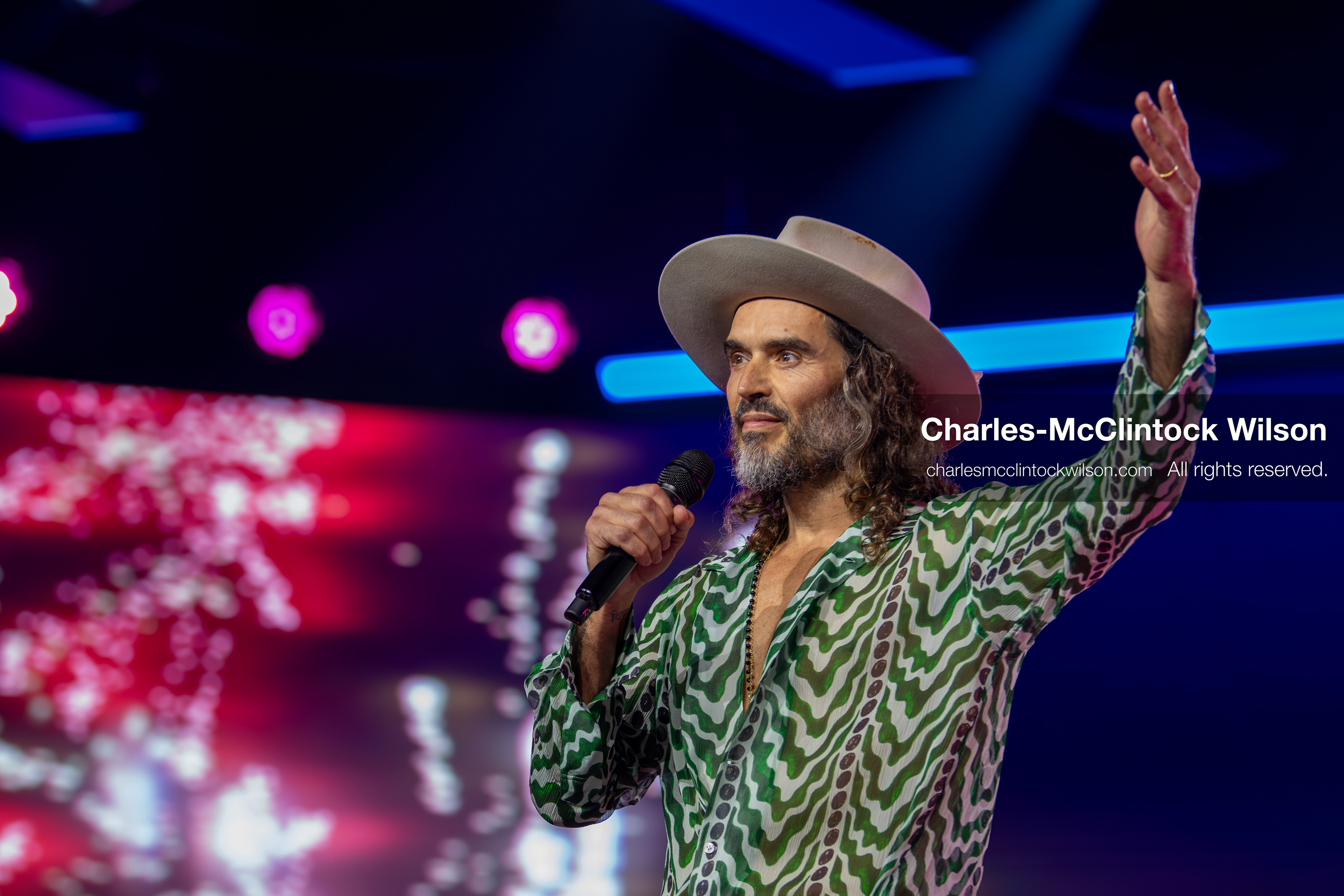 December 18, 2025, Phoenix, Arizona, USA: Russell Brand speaks during Day One of Turning Point USA’s AmericaFest 2025 at the Phoenix Convention Center in Phoenix, Arizona.   (Credit Image: © Charles‑McClintock Wilson/ZUMA Press Wire)
