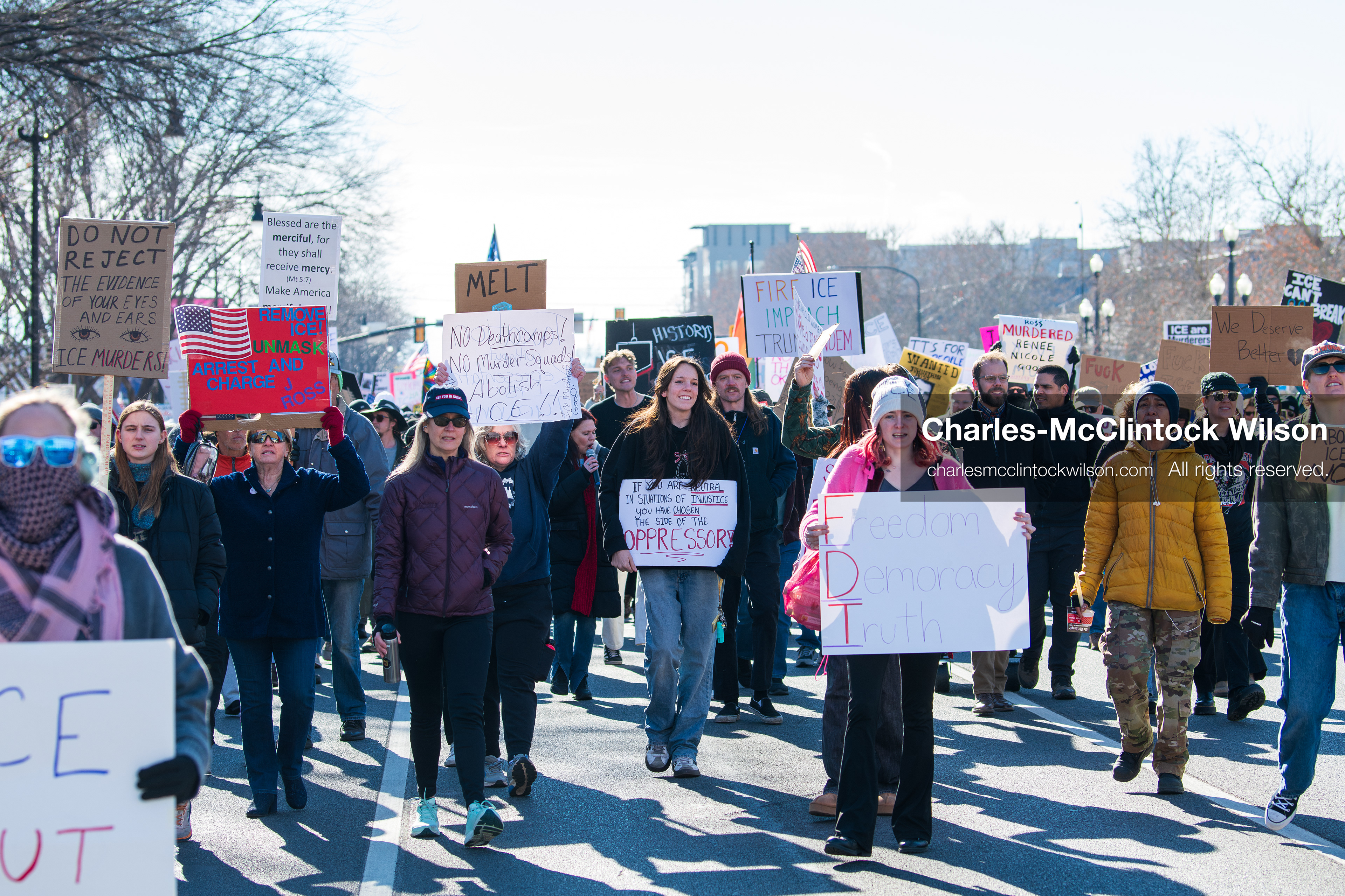 Salt Lake City, Utah, January 10, 2026: A group of demonstrators marches through downtown Salt Lake City during the ICE Out for Good protest, which began at Washington Square Park, with participants carrying signs and personal items as they walk together. (Credit Image: © Charles‑McClintock Wilson/ZUMA Press Wire)