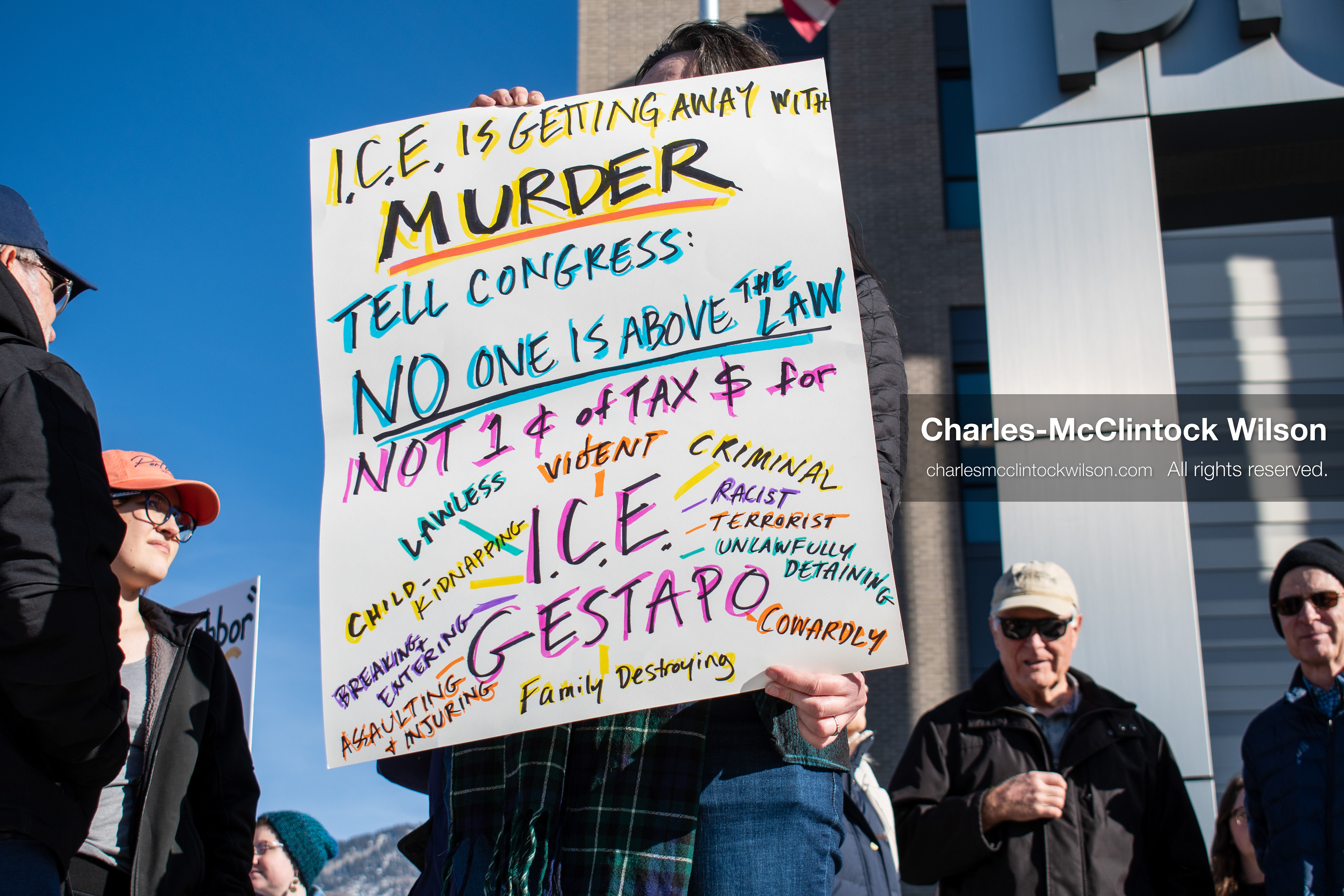 January 20, 2026, Provo, Utah, USA: A demonstrator stands outside Provo City Hall during the Free America Walkout protest in Provo Utah on January 20 2026. The nationwide event called for immigration reform and changes to detention practices. 