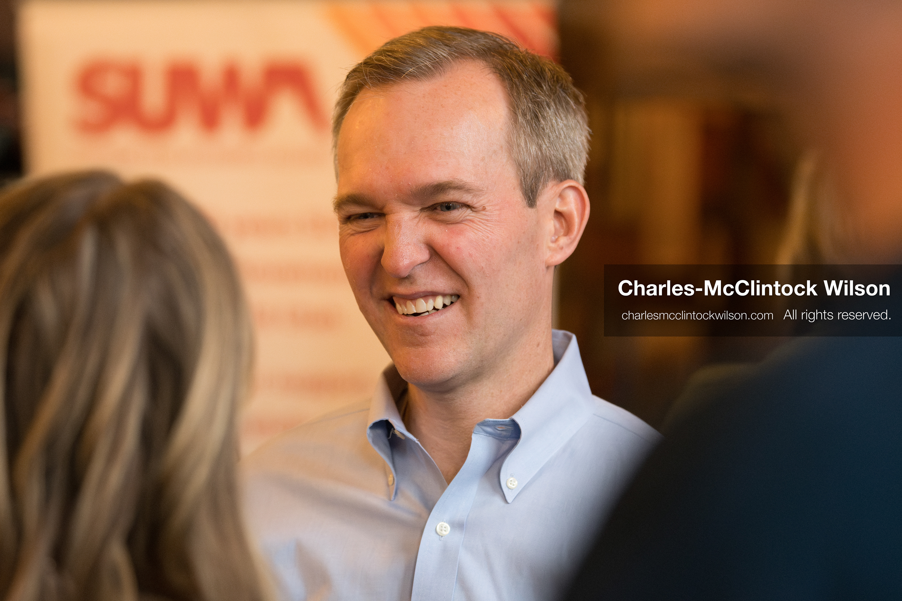 April 22, 2026, Salt Lake City, Utah, USA: Democratic congressional candidate BEN McADAMS speaks with attendees before the Earth Day 1st District Candidate Debate at Church and State Marketplace. The event, hosted by Stewardship Utah, brought together candidates to discuss environmental and policy issues ahead of the 2026 election. (Credit Image: © Charles-McClintock Wilson/ZUMA Press Wire)