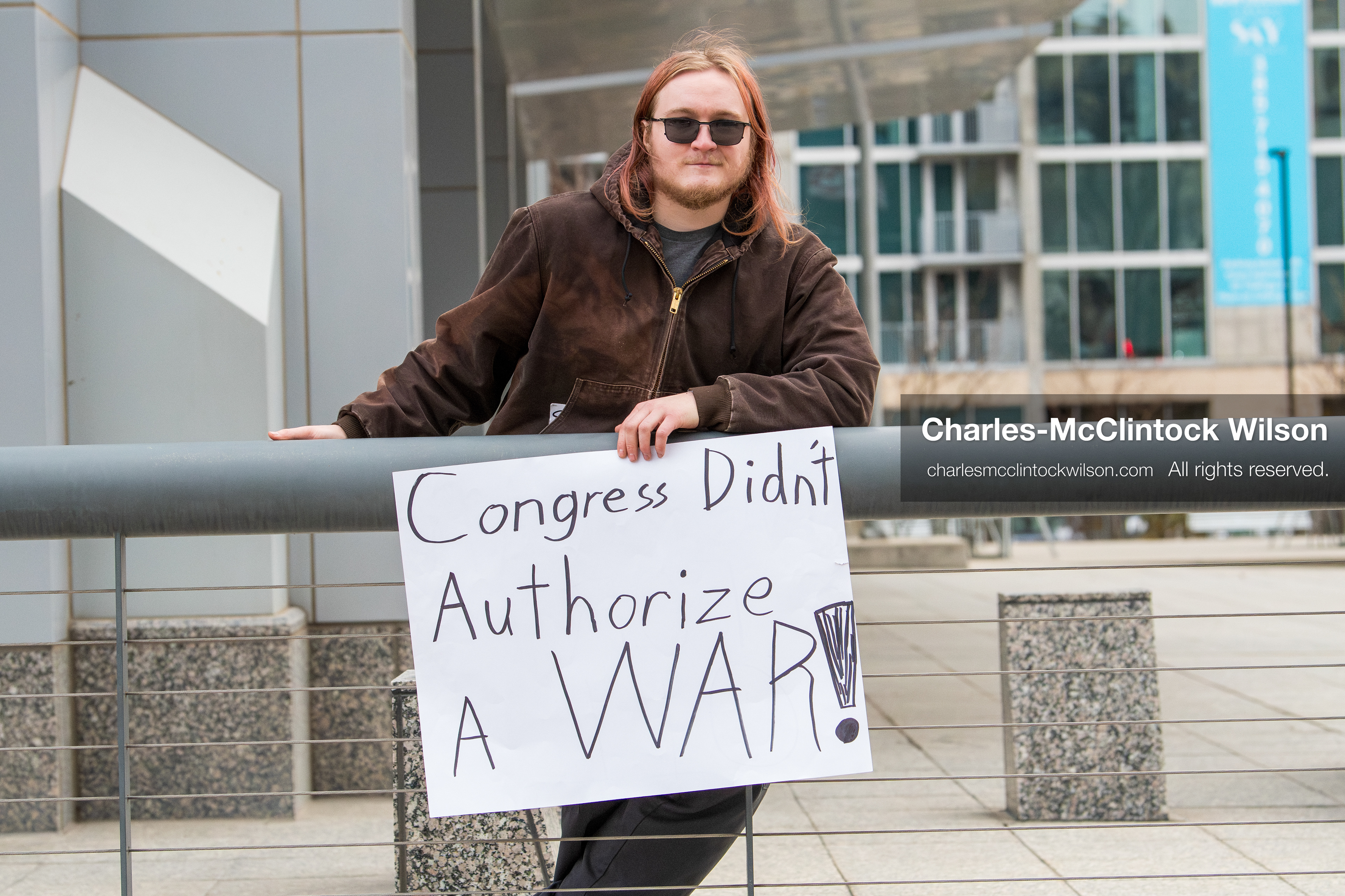 January 3, 2026, Salt Lake City, Utah, USA: A protester holds a sign during a demonstration against US action in Venezuela outside the Wallace Federal Building in Salt Lake City, Utah. The protest was part of a nationwide mobilization responding to recent military developments. (Credit Image: (c) Charles‑McClintock Wilson/ZUMA Press Wire)