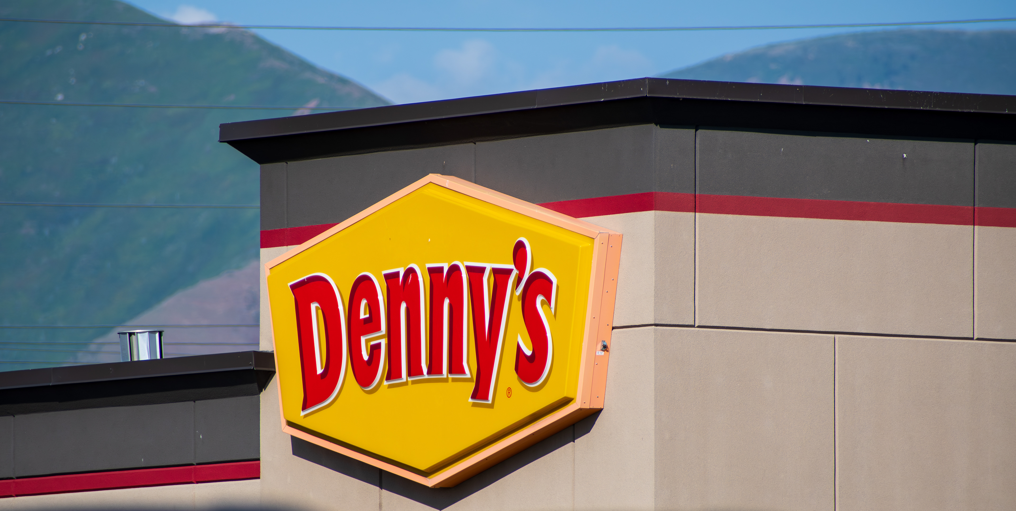 SPANISH FORK, UTAH, USA - JUNE 8, 2025: Exterior view of a Denny's restaurant. Denny's is an American table service diner-style restaurant chain.