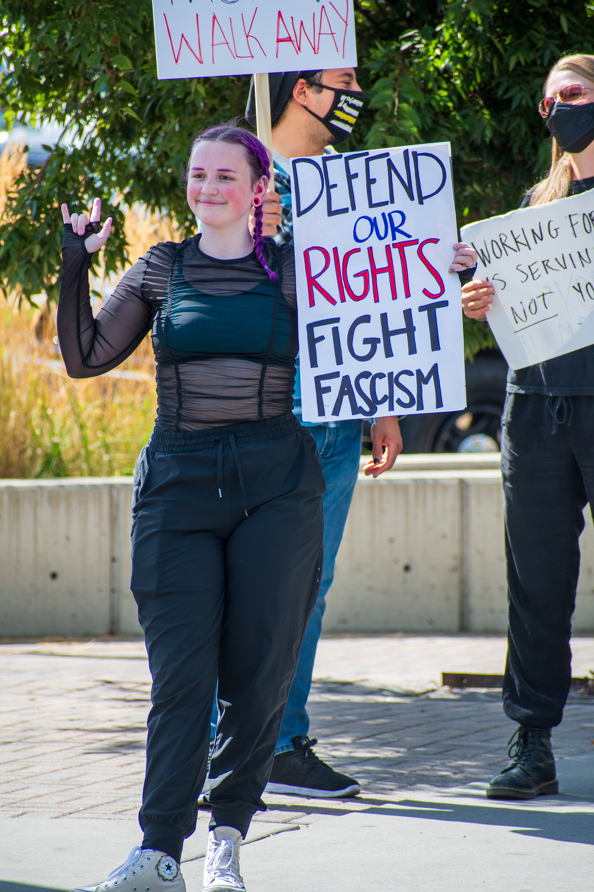 September 15, 2025 – Provo, Utah, United States: Demonstrators hold signs outside the Utah Valley Convention Center during a protest against the Department of Homeland Security career expo, voicing opposition to federal policing and immigration enforcement. Photograph by Charles‑McClintock Wilson / ZUMA Press Wire