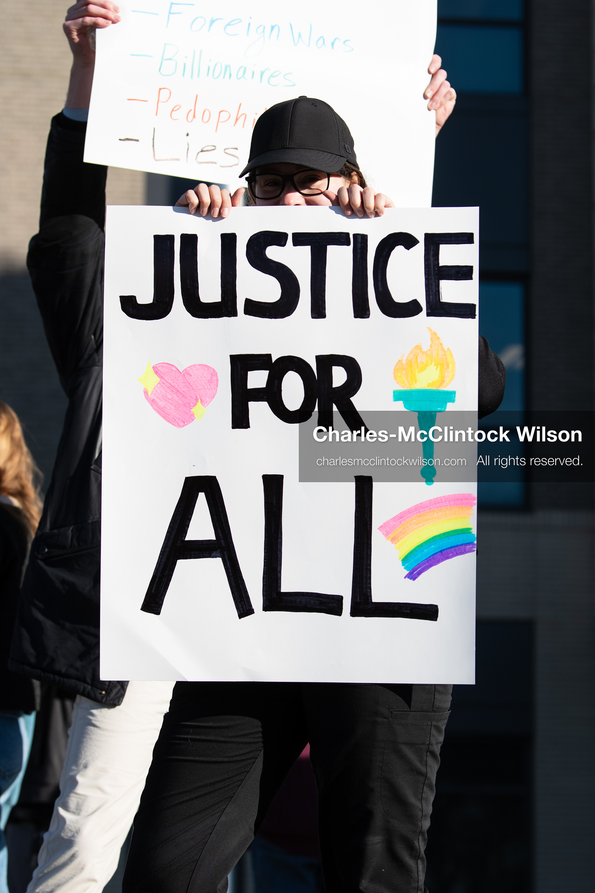  January 20, 2026, Provo, Utah, USA: A demonstrator stands outside Provo City Hall during the Free America Walkout protest in Provo Utah on January 20 2026. The nationwide event called for immigration reform and changes to detention practices.