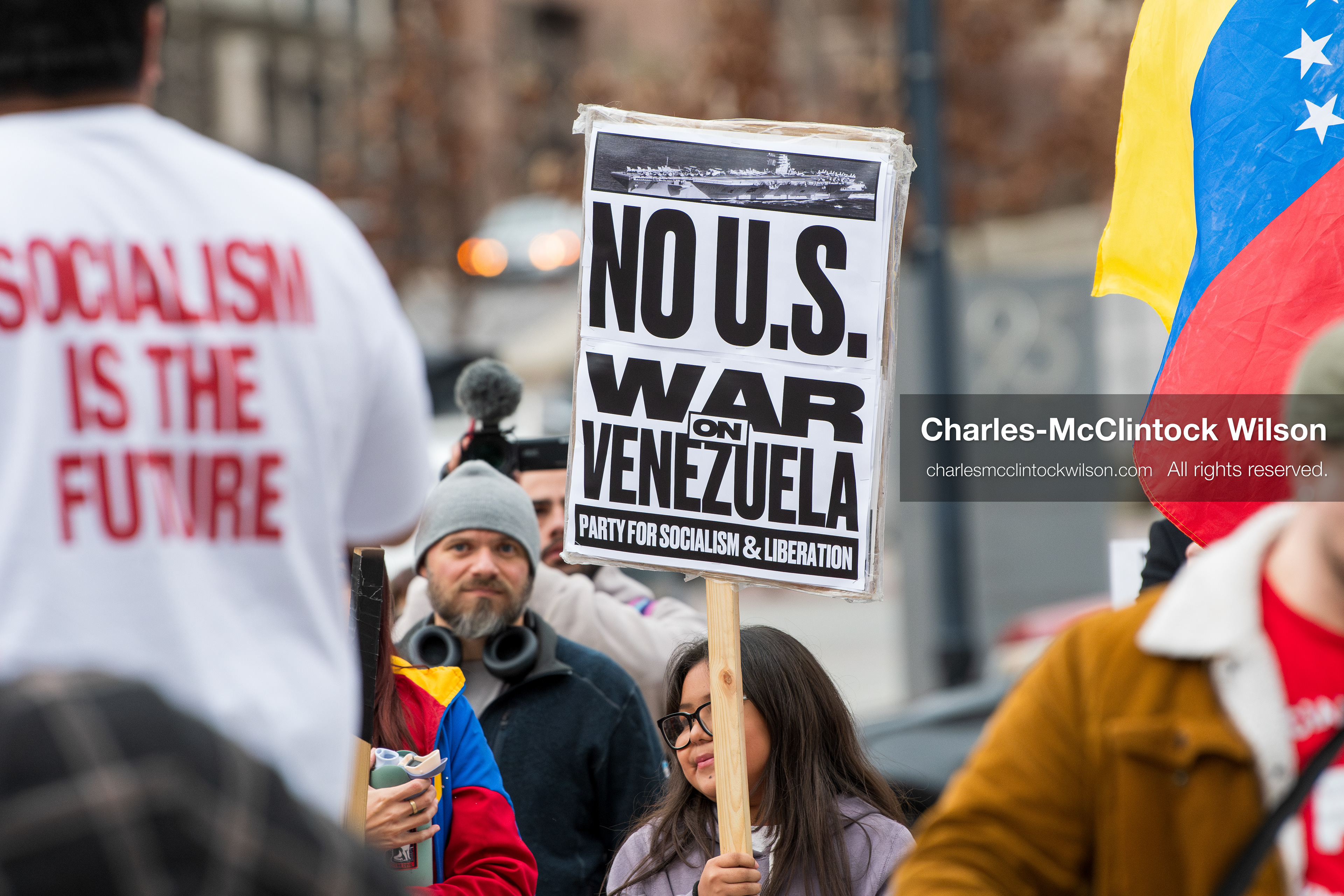 January 3, 2026, Salt Lake City, Utah, USA: A protester holds a sign during a demonstration against US action in Venezuela outside the Wallace Federal Building in Salt Lake City, Utah. The protest was part of a nationwide mobilization responding to recent military developments. (Credit Image: (c) Charles‑McClintock Wilson/ZUMA Press Wire)