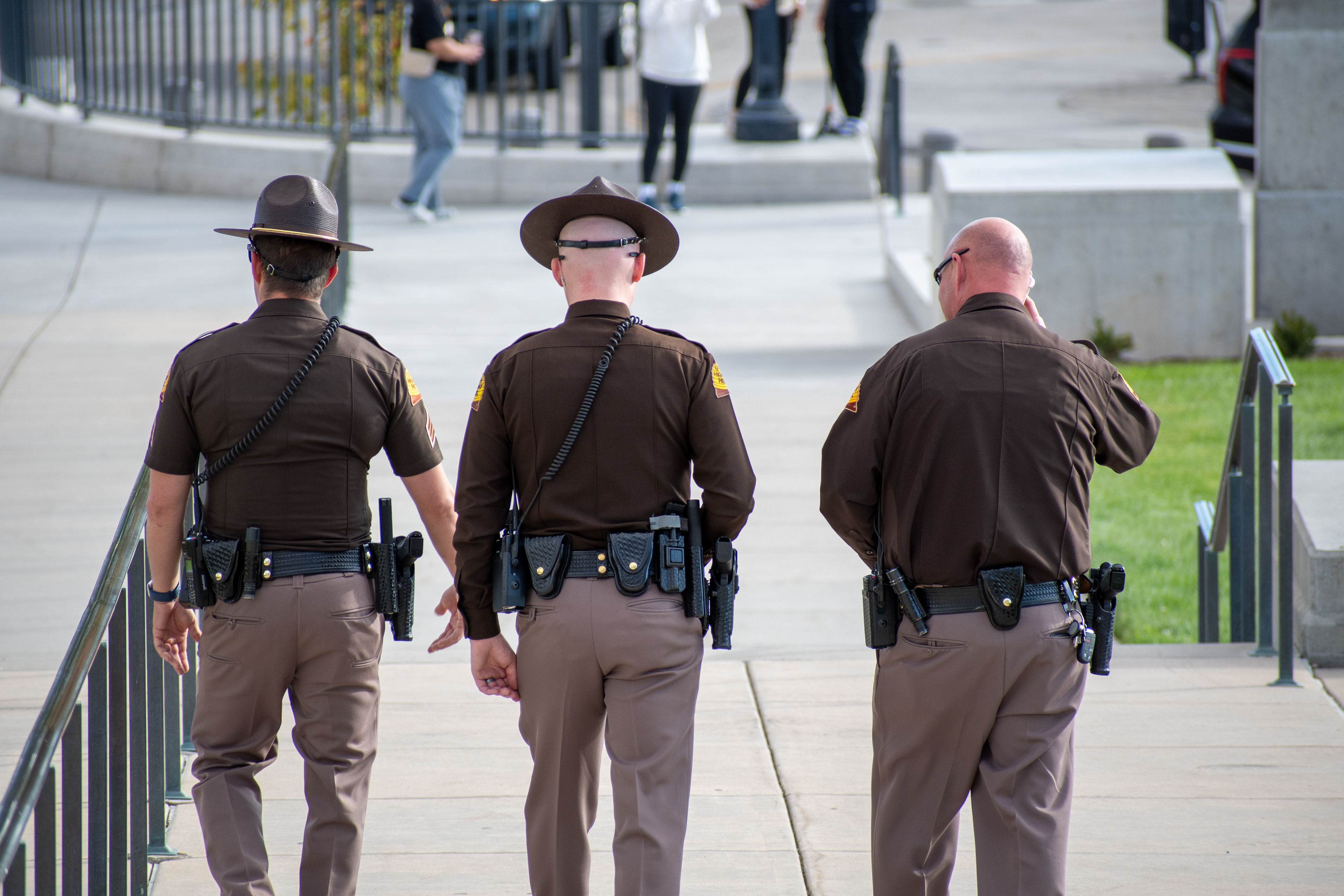 October 10, 2025, Salt Lake City, Utah, USA: Utah Highway Patrol officers walk along a paved pathway during the Free Palestine Rally at the Utah State Capitol. (Credit Image: © Charles-McClintock Wilson/ZUMA Press Wire)