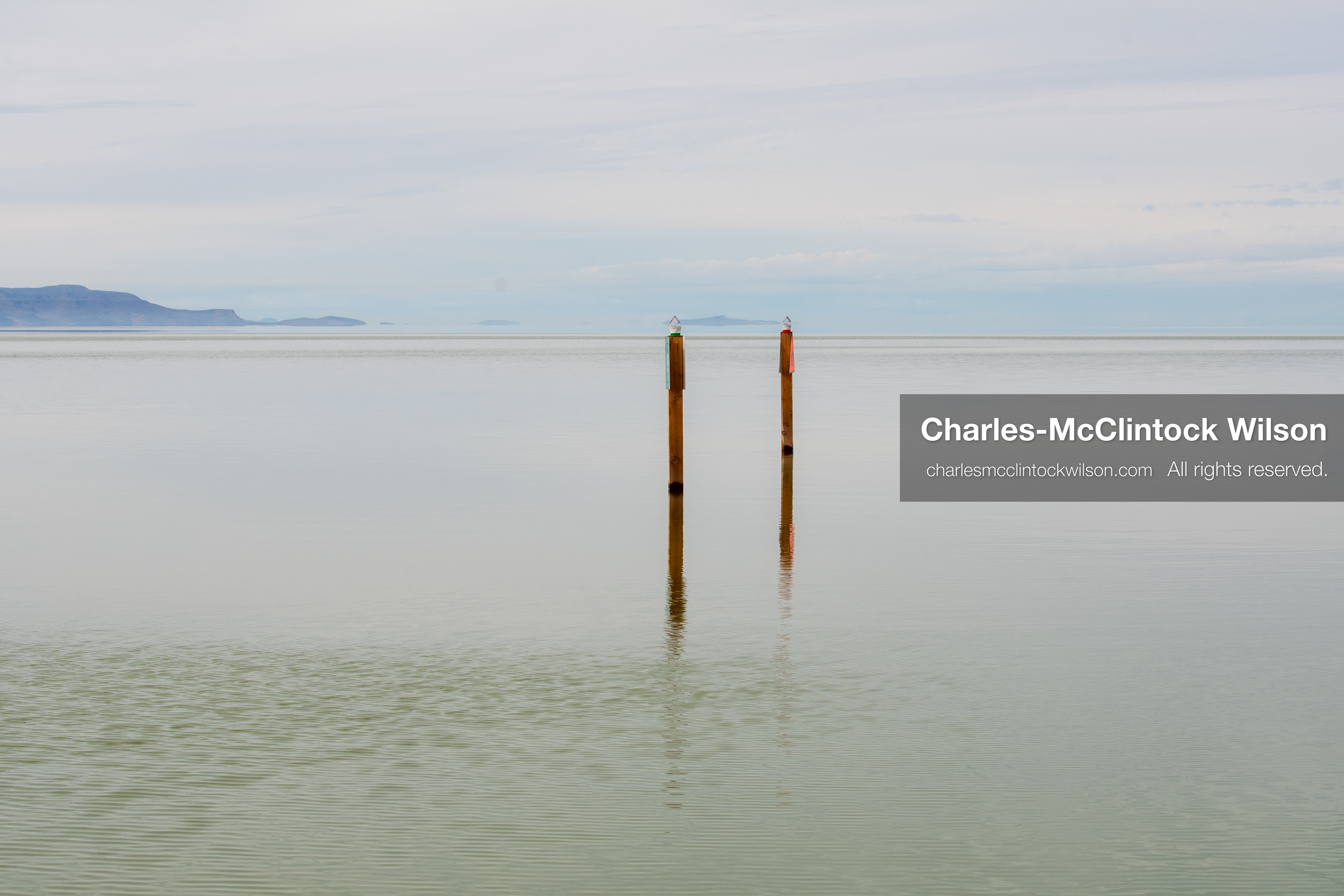 March 1, 2026, Great Salt Lake, Utah, USA: Navigation markers stand in calm water at the Great Salt Lake as the region continues to experience historically low water levels. Reports from state officials and the Great Salt Lake Strike Team state that the lake remains in a serious adverse‑effects range, with elevations among the lowest recorded in more than one hundred years. The lake has drawn increased public attention as lawmakers consider large‑scale water projects and long‑term plans to address declining conditions. (Credit Image: © Charles‑McClintock Wilson/ZUMA Press Wire)