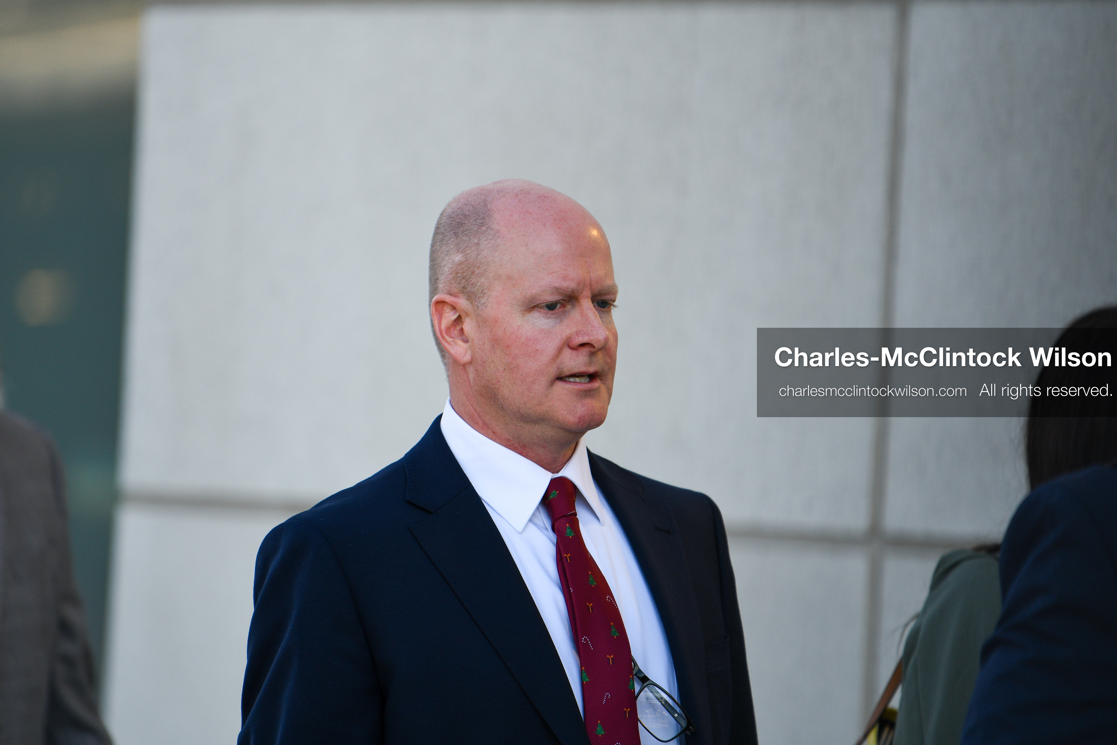 PROVO, UTAH, USA – DECEMBER 11, 2025: Chad Grunander, center, a prosecutor with the Utah County Attorney’s Office, arrives at the Fourth District Court in Provo for the first in‑person court appearance of Tyler Robinson in the Charlie Kirk murder case. (Credit Image: © Charles‑McClintock Wilson/ZUMA Press Wire)