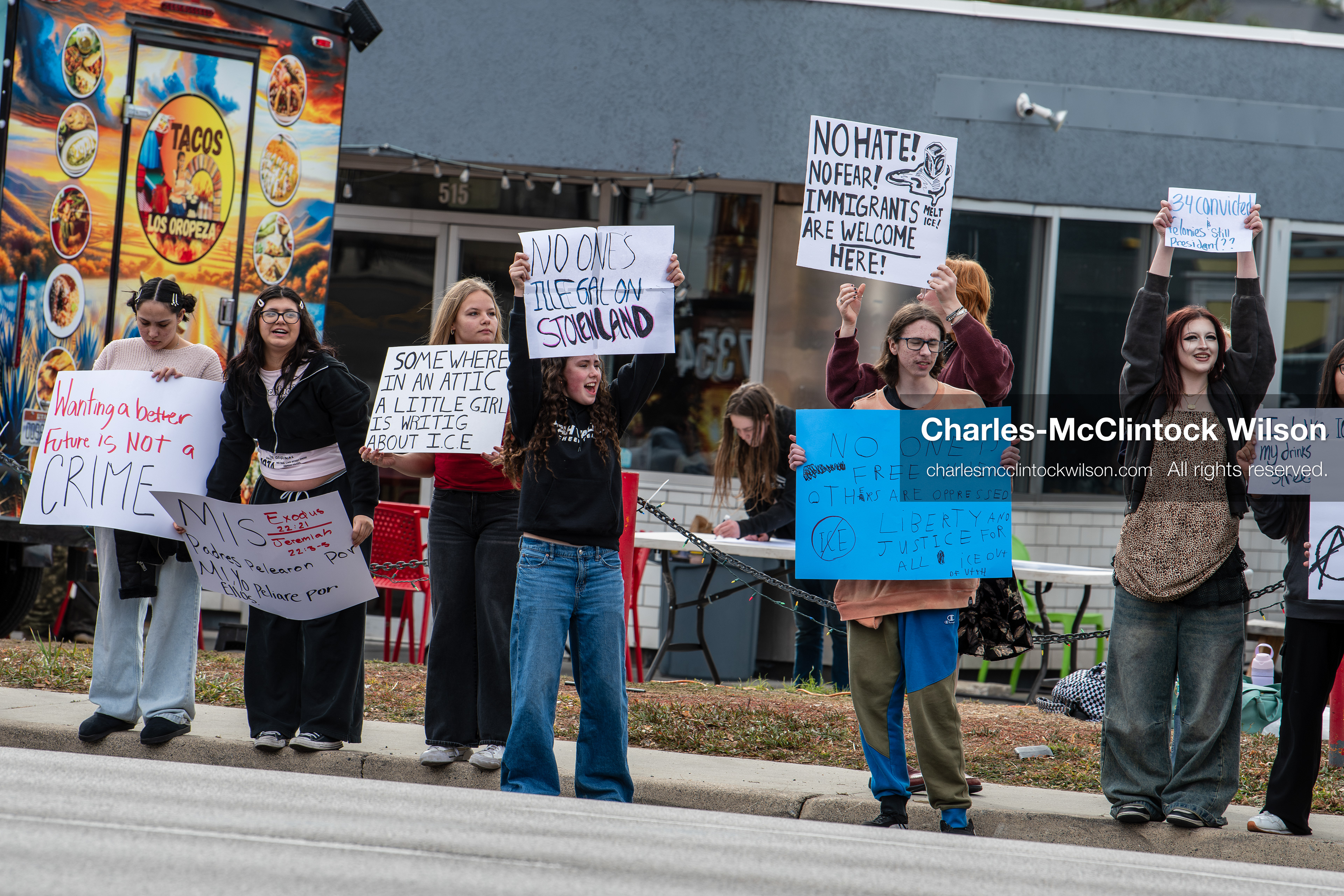 February 11, 2026, Orem, Utah, USA: Students stand on the sidewalk along State Street during a student‑led protest involving participants from multiple Orem schools. (Credit Image: © Charles‑McClintock Wilson/ZUMA Press Wire)