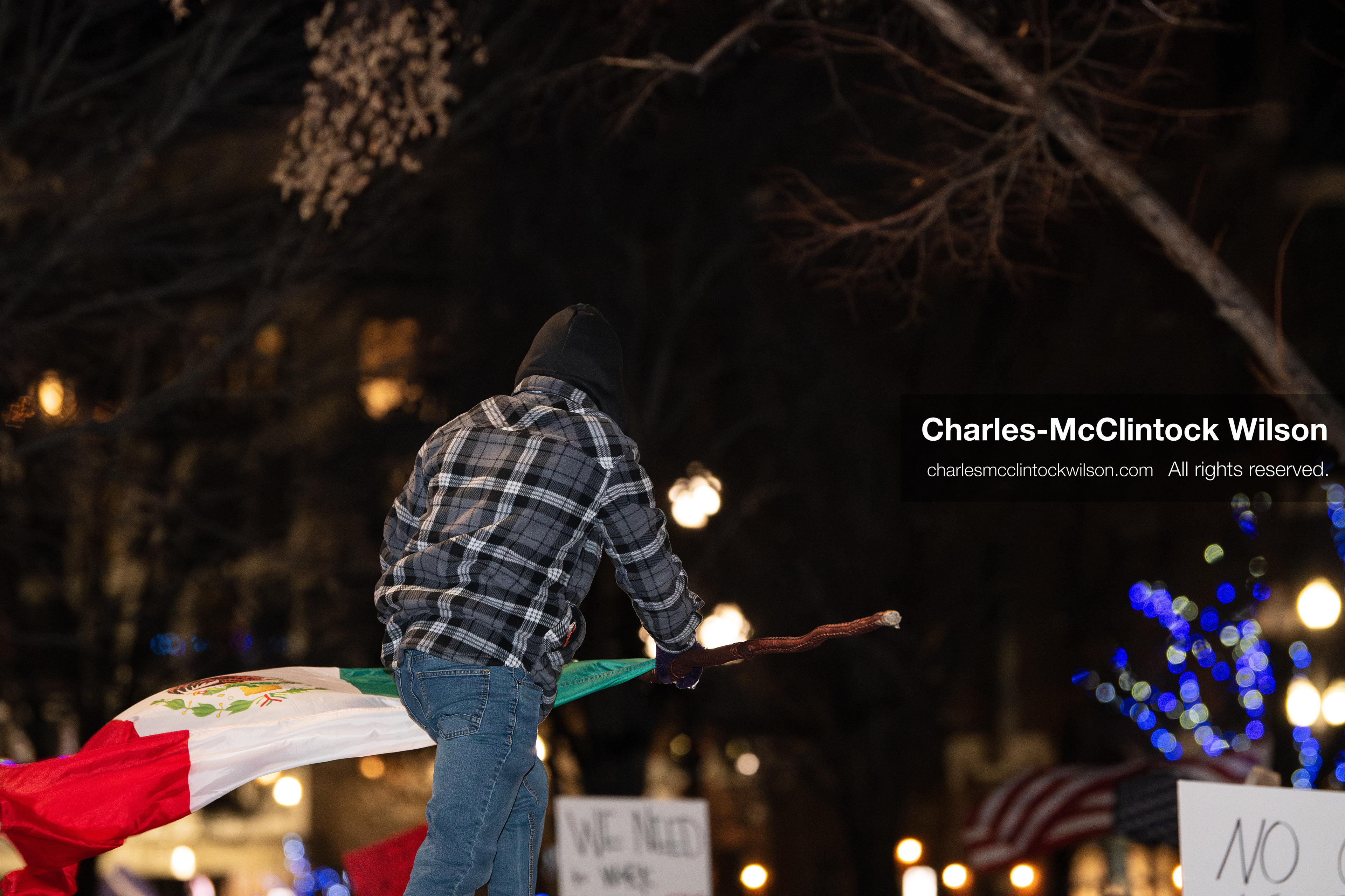 January 8, 2026, Salt Lake City, Utah, USA: A demonstrator waves a Mexican flag while standing on a platform during an anti ICE protest at Pioneer Park in Salt Lake City Utah on Jan 8 2026. The rally followed the death of Renee Nicole Good a Minneapolis woman who was fatally shot during an encounter with immigration authorities and drew hundreds calling for accountability and changes to enforcement practices. (Credit Image: © Charles-McClintock Wilson/ZUMA Press Wire)