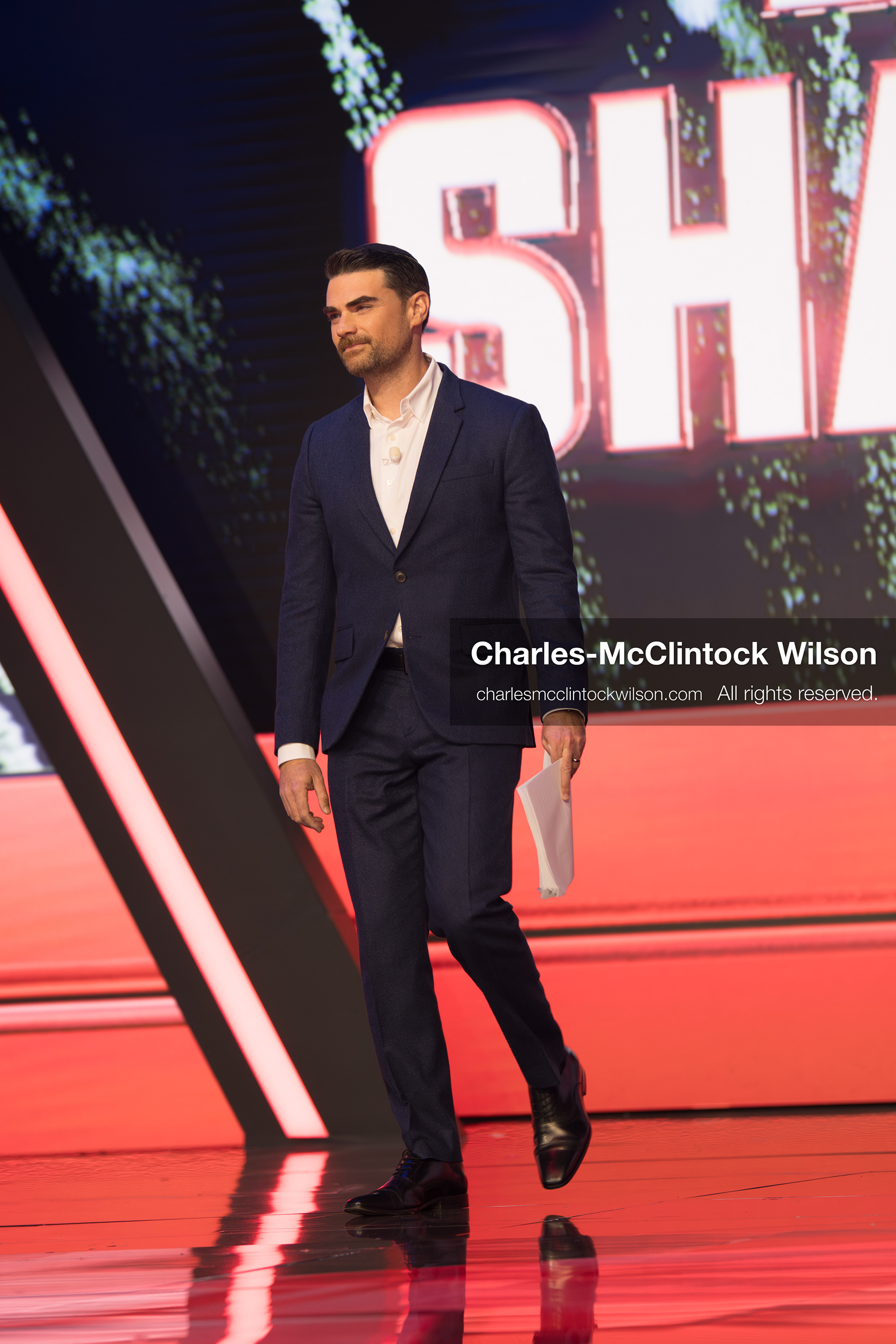 December 18, 2025, Phoenix, Arizona, USA: Ben Shapiro walks toward the stage during Day One of Turning Point USA’s AmericaFest 2025 at the Phoenix Convention Center in Phoenix, Arizona.