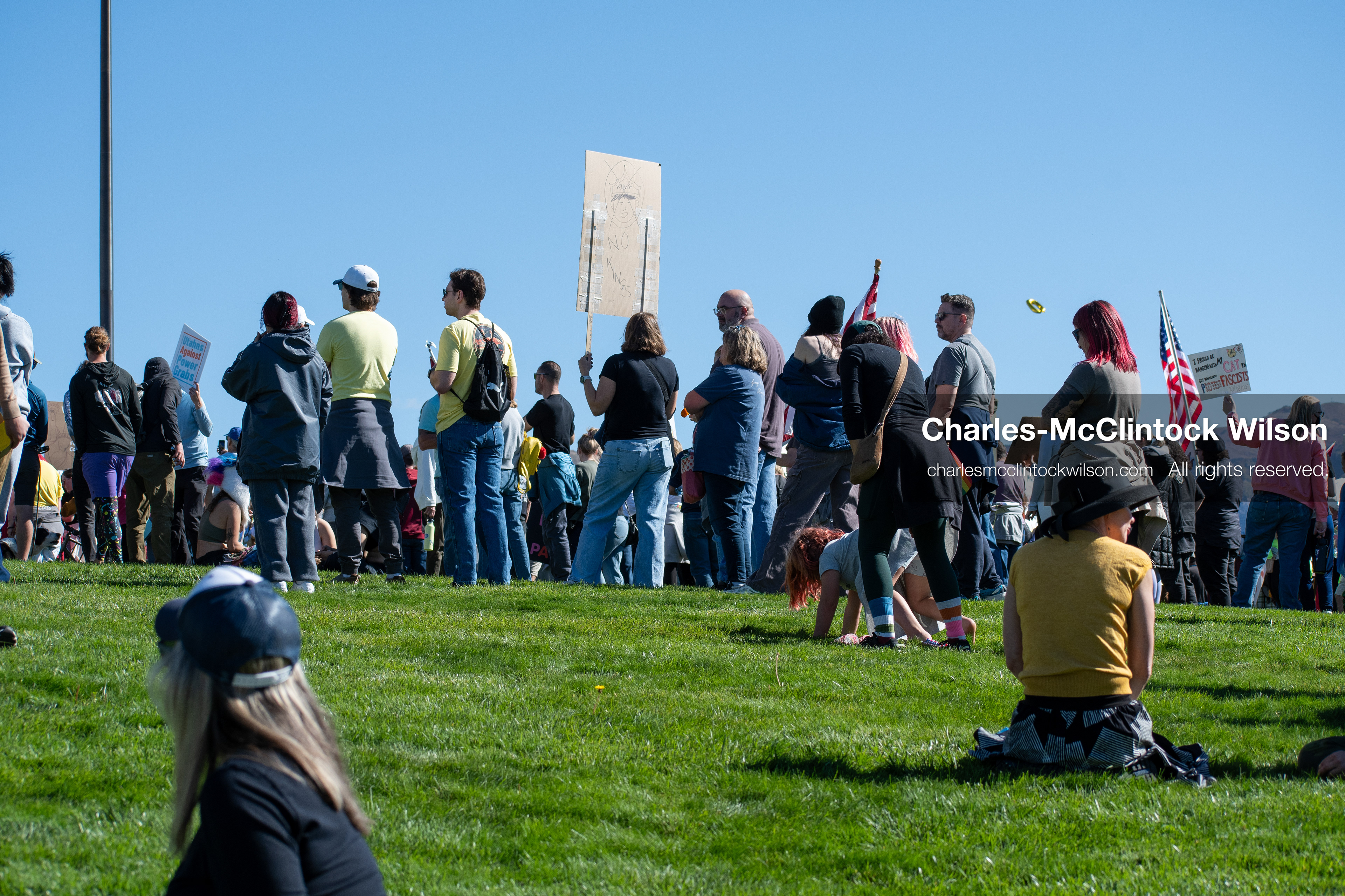October 18, 2025, Salt Lake City, Utah, USA: Demonstrators gather on the lawn of the Utah State Capitol during a "No Kings" protest. The protest was part of a nationwide mobilization.