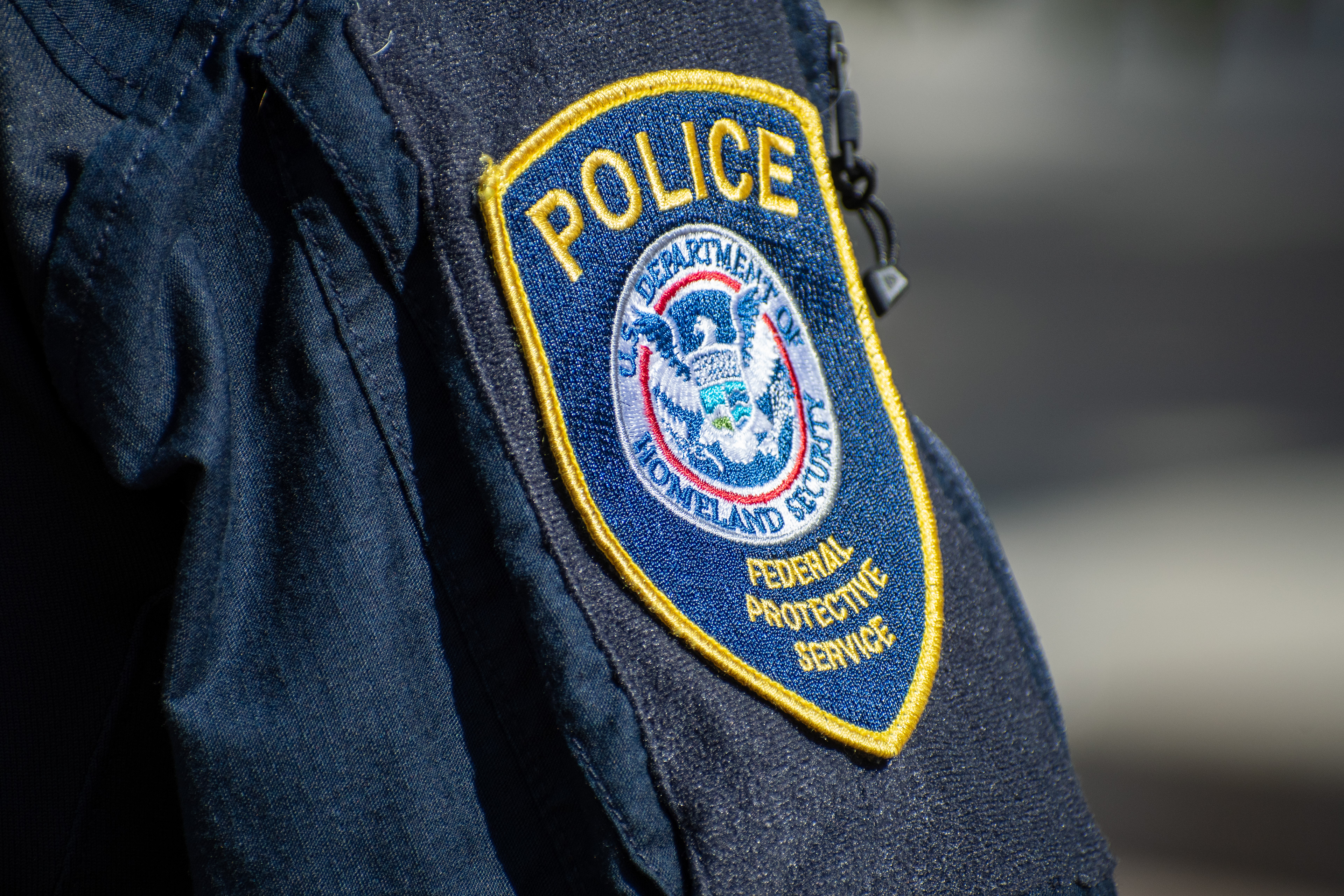 September 15, 2025 – Provo, Utah, United States: A patch reading “POLICE – DEPARTMENT OF HOMELAND SECURITY – FEDERAL PROTECTIVE SERVICE” is seen on the uniform of a Homeland Security police officer during a Department of Homeland Security career expo at the Utah Valley Convention Center. Photograph by Charles‑McClintock Wilson / ZUMA Press Wire