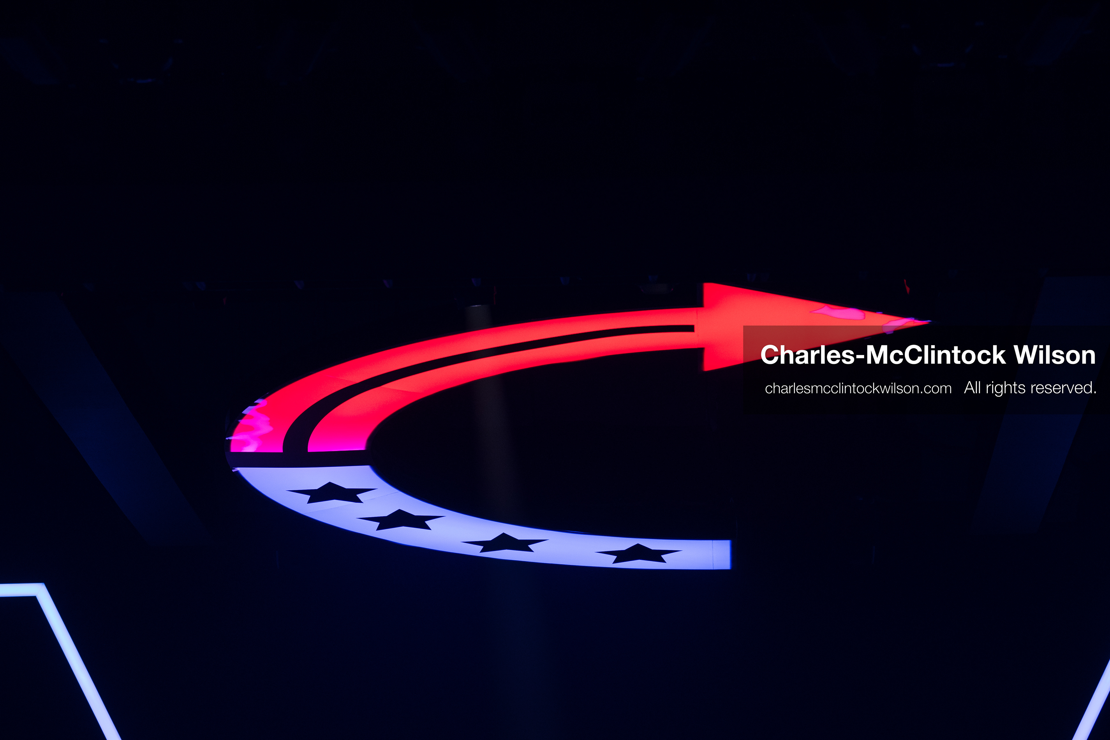December 18, 2025, Phoenix, Arizona, USA: The Turning Point USA logo, a curved red and purple arrow with five black stars, hangs above the stage at AmericaFest 2025 at the Phoenix Convention Center, the first edition of the event held since the death of Charlie Kirk. (Credit Image: (c) Charles-McClintock Wilson/ZUMA Press Wire)