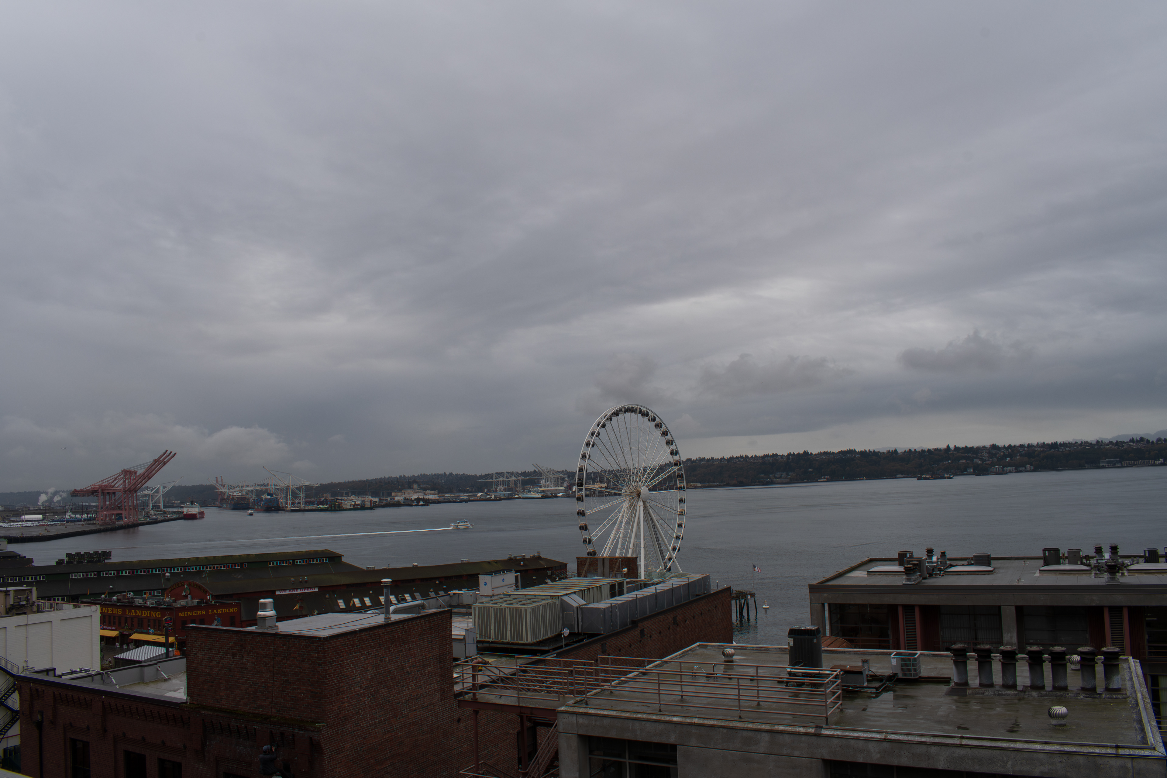 SEATTLE, WA, USA - APR 7, 2025: View of the Seattle Great Wheel on Elliott Bay in Seattle, WA, US. It was constructed starting on April 17, 2012, and officially opened to the public on June 29, 2012.