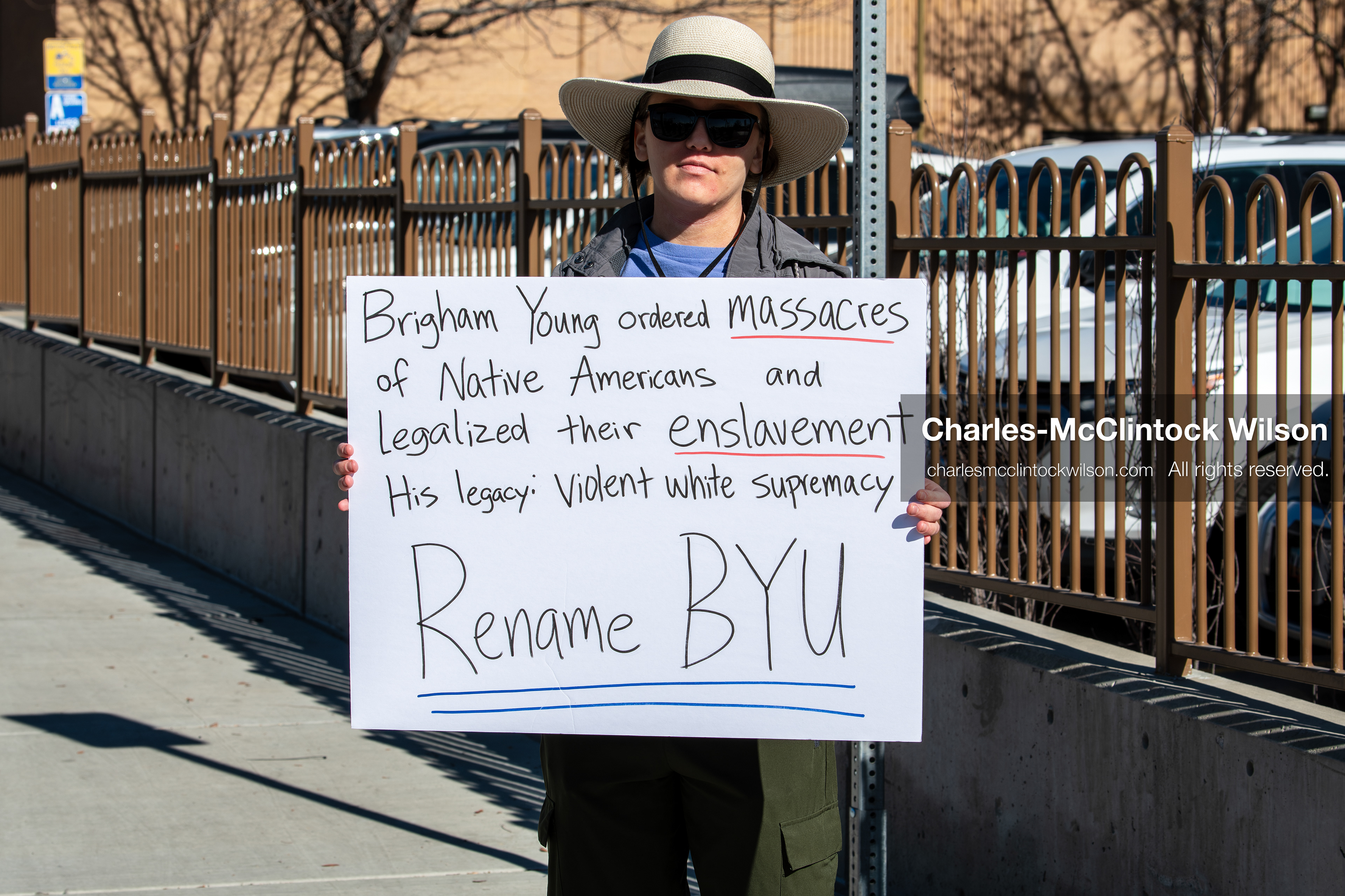 February 5, 2026, Provo, Utah, USA: A demonstrator holds a sign during a gathering near Brigham Young University in Provo where students and community members protested the presence of US Customs and Border Protection recruiters at a career fair held on the BYU campus. (Credit Image: © Charles McClintock Wilson/ZUMA Press Wire)