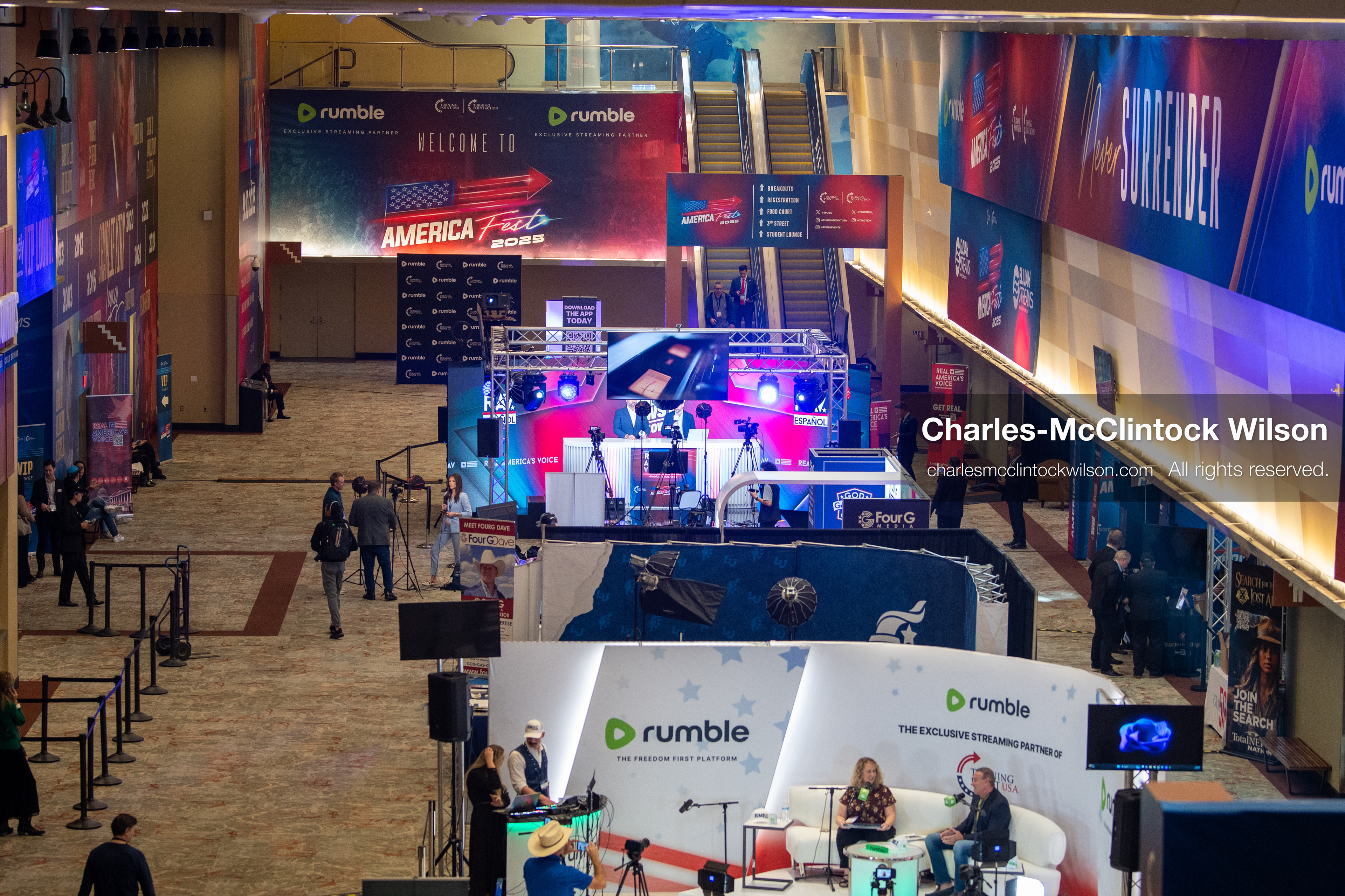 December 18, 2025, Phoenix, Arizona, USA: Attendees circulate through the media and broadcast zone at AmericaFest 2025 inside the Phoenix Convention Center, the first edition of the event held since the death of Charlie Kirk. (Credit Image: (c) Charles-McClintock Wilson/ZUMA Press Wire)