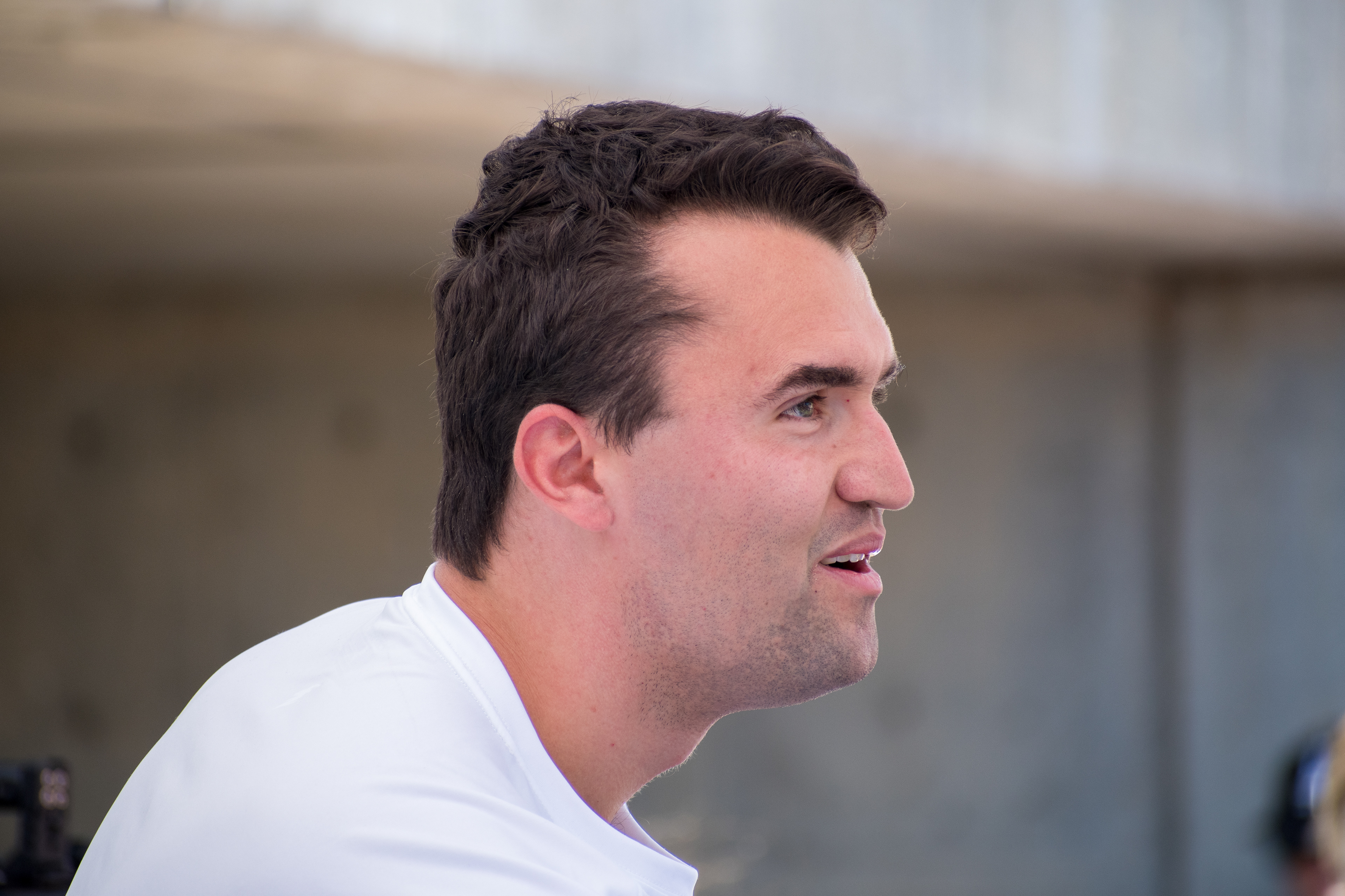 OREM, UTAH – SEPTEMBER 10, 2025: Charlie Kirk appears focused and resolute during a public event at Utah Valley University. Captured in a moment of quiet intensity, Kirk looks off-camera as media lenses track his movements. The image reflects the tension and conviction that defined his final public appearance before the shooting incident that disrupted the event. © Charles-McClintock Wilson / ZUMA Press 