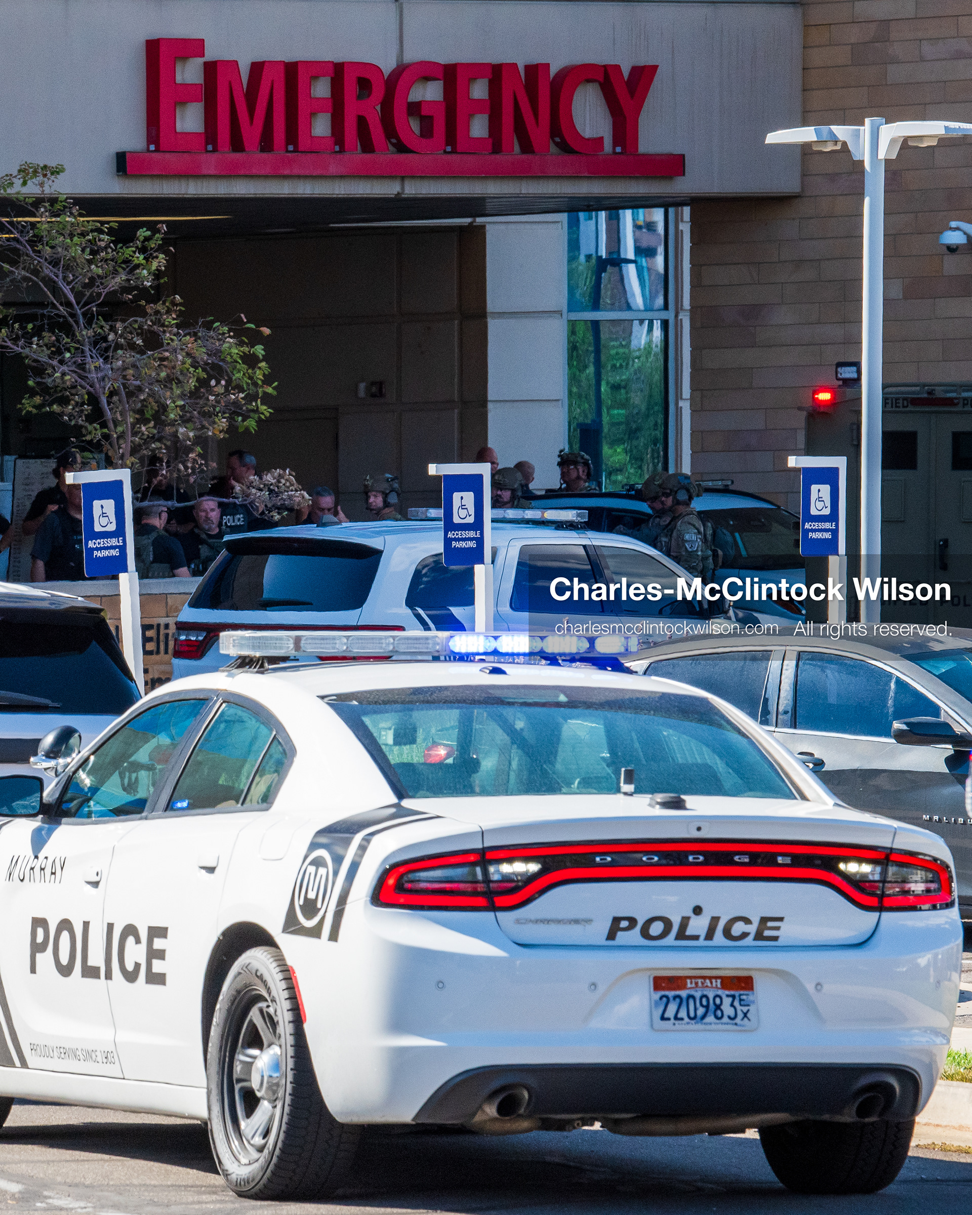 August 17, 2026, Murray, Utah, USA: Multiple law enforcement vehicles and an armored tactical vehicle stand outside the emergency department entrance at Intermountain Medical Center in Murray, Utah, on Monday. Multiple police agencies secured the hospital perimeter as a safety precaution after shooting victims were brought in from a fatal shootout outside a funeral in nearby Kearns. (Credit Image: © Charles McClintock Wilson/ZUMA Press Wire)