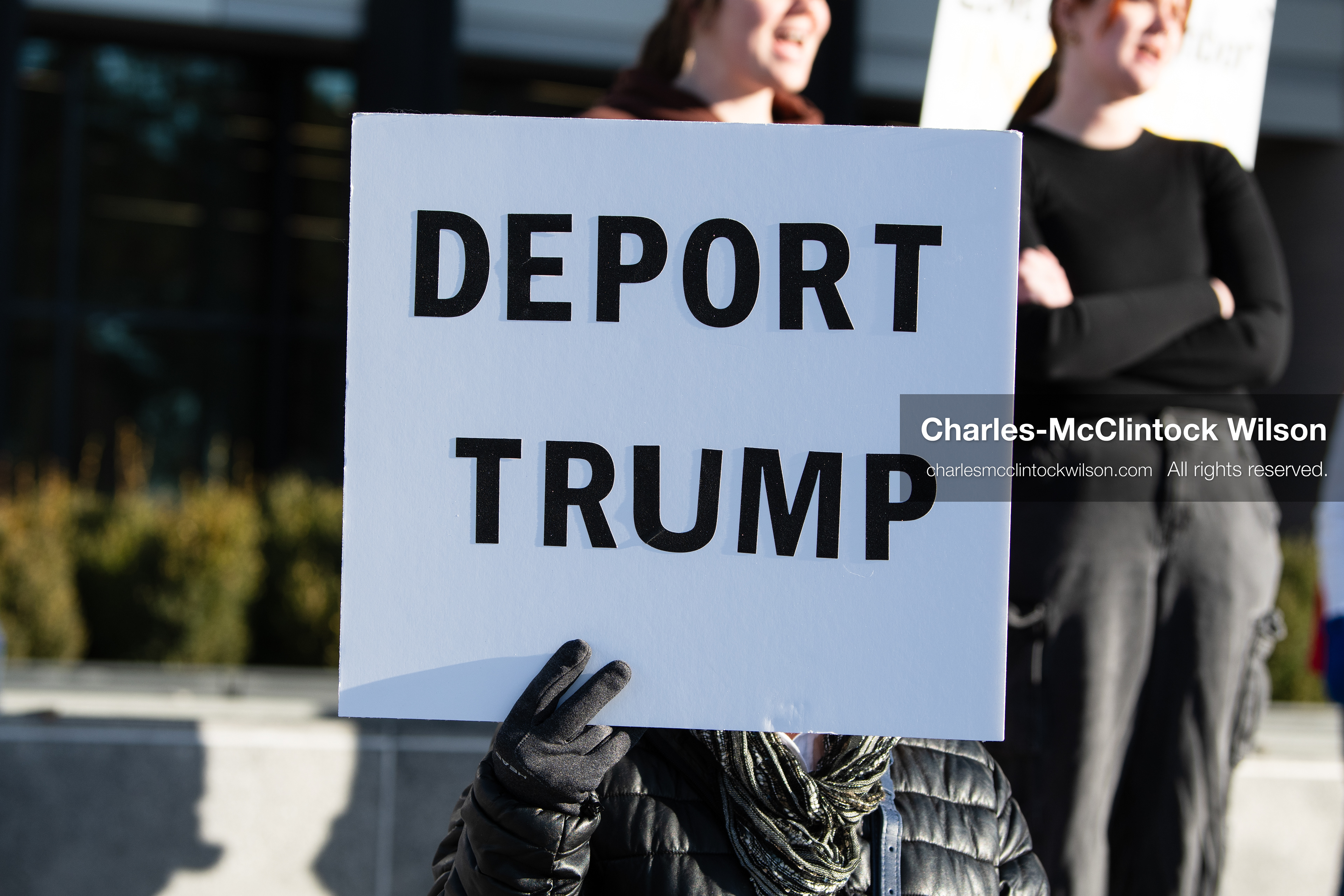  January 20, 2026, Provo, Utah, USA: A demonstrator stands outside Provo City Hall during the Free America Walkout protest in Provo Utah on January 20 2026. The nationwide event called for immigration reform and changes to detention practices.