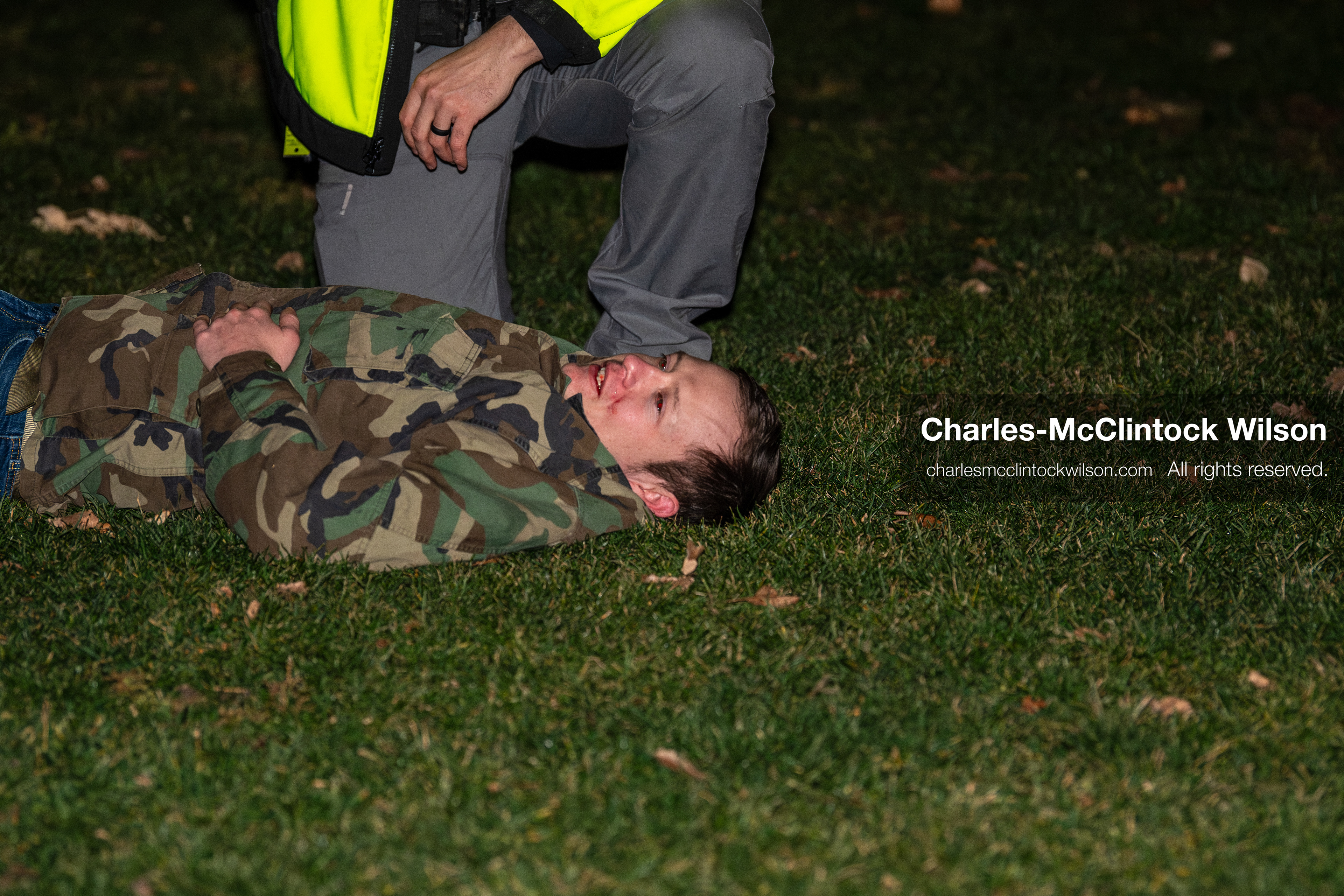 January 8, 2026, Salt Lake City, Utah, USA: A demonstrator lies on the ground after being hurt during a confrontation at an anti ICE protest at Pioneer Park in Salt Lake City Utah on Jan 8 2026. The individual is a supporter of US president Donald Trump and is being assisted by law enforcement at the scene. The rally followed the death of Renee Nicole Good during an encounter with immigration authorities in Minneapolis and drew hundreds calling for accountability and changes to enforcement practices. (Credit Image: © Charles-McClintock Wilson/ZUMA Press Wire)