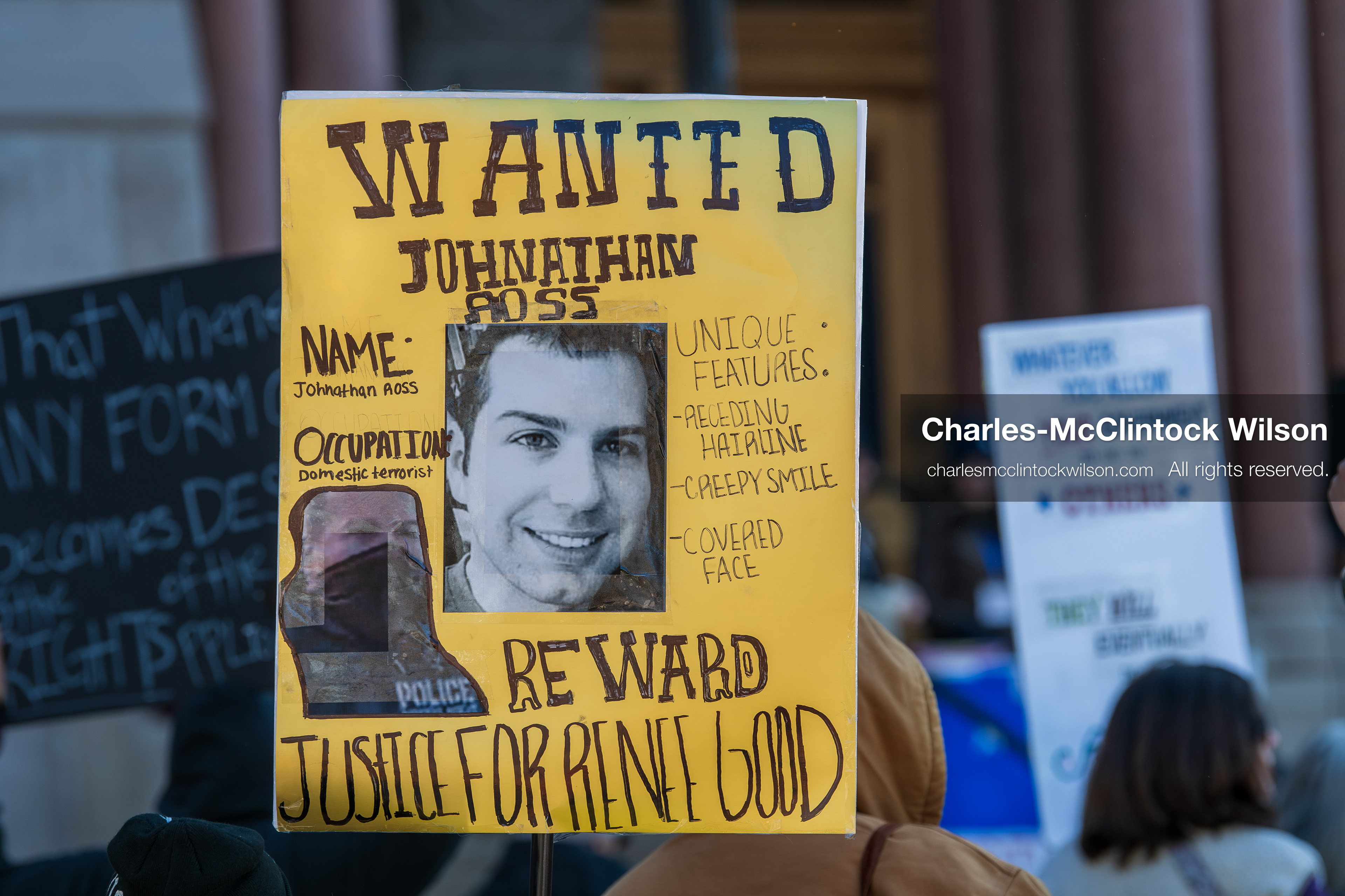Salt Lake City, Utah, January 10, 2026: A protest sign designed to resemble a "WANTED" poster is held during the ICE Out for Good protest at Washington Square Park. The sign names Johnathan Ross — the ICE agent who fatally shot Renee Nicole Good — and calls for justice. (Credit Image: © Charles‑McClintock Wilson/ZUMA Press Wire)