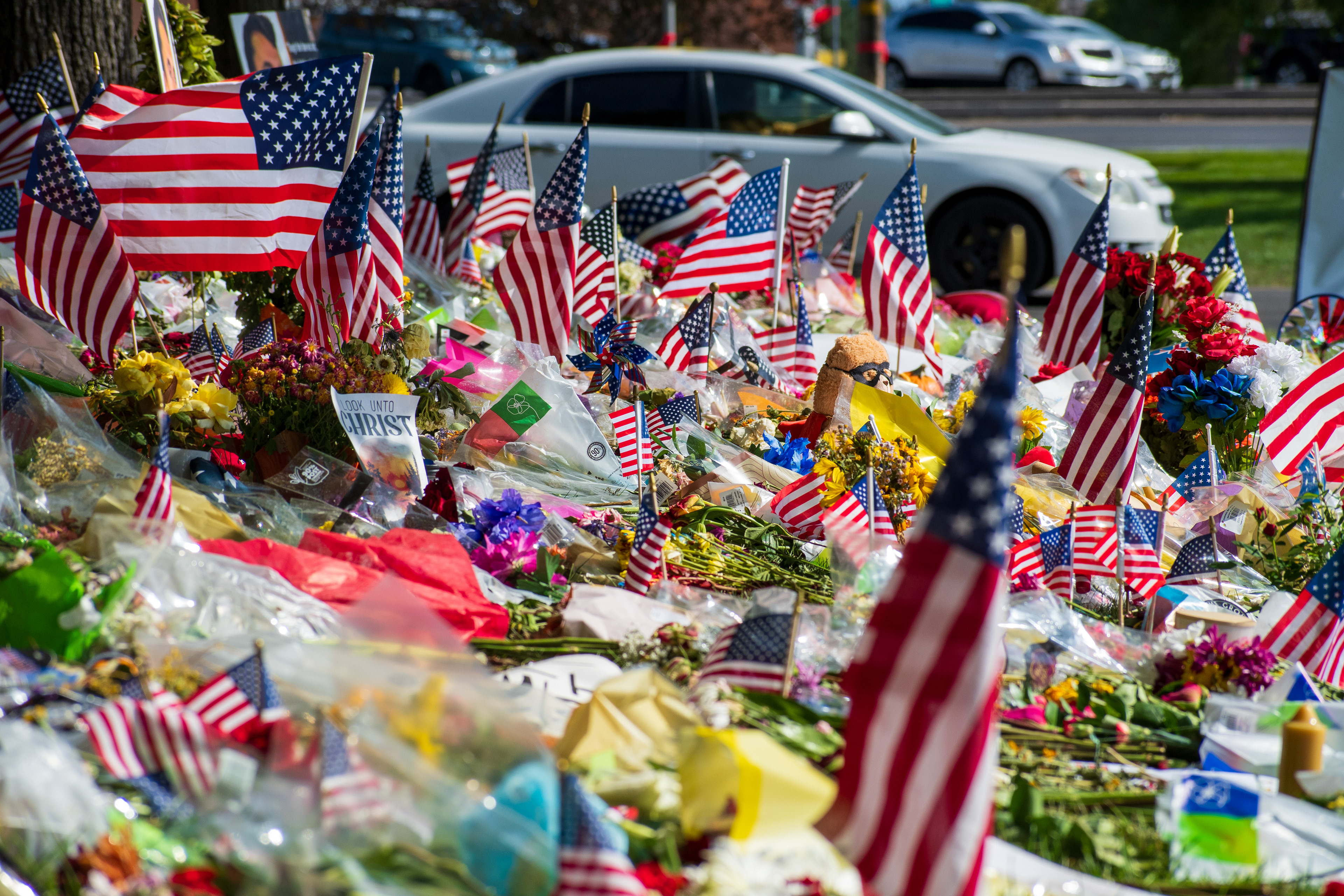 OREM, UTAH – SEPTEMBER 15, 2025: A memorial honoring Charlie Kirk is seen on the campus of Utah Valley University, featuring American flags, candles, flowers, and handwritten signs arranged around a large portrait. The tribute appeared days after Kirk’s final public event at the university. © Charles‑McClintock Wilson / ZUMA Press