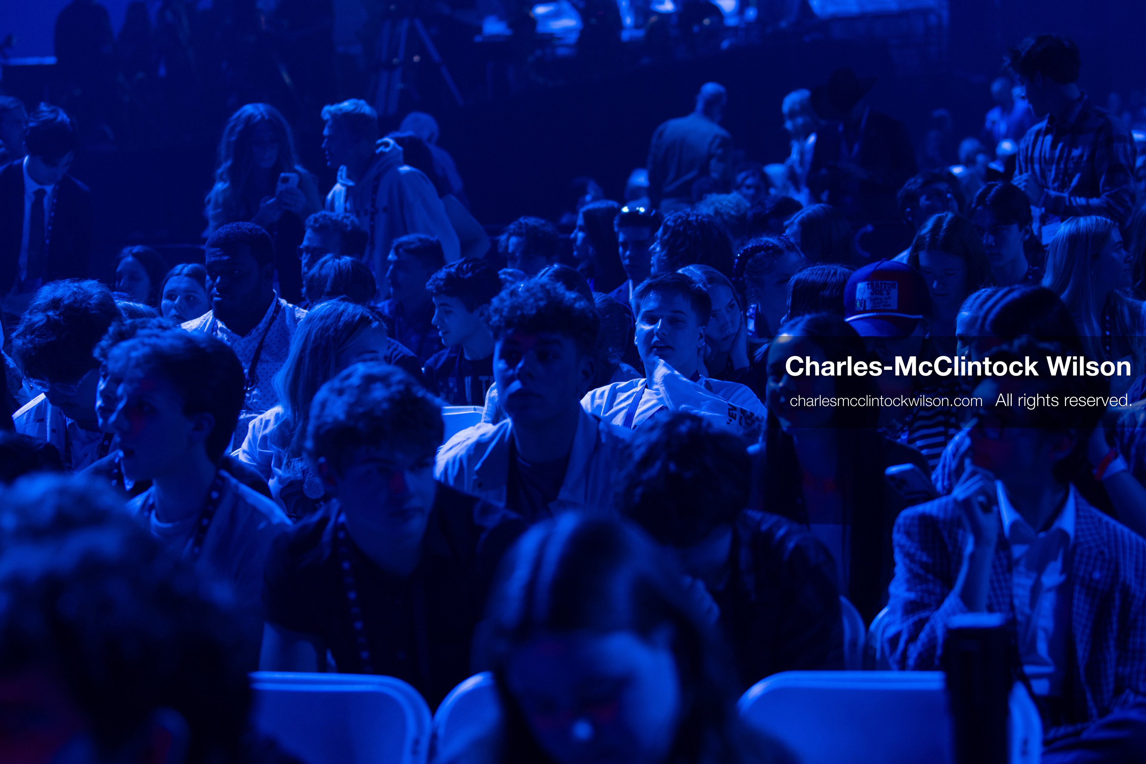 December 18, 2025, Phoenix, Arizona, USA: Attendees fill rows of white chairs under blue lighting during AmericaFest 2025 at the Phoenix Convention Center, the first edition of the event held since the death of Charlie Kirk. (Credit Image: (c) Charles-McClintock Wilson/ZUMA Press Wire)