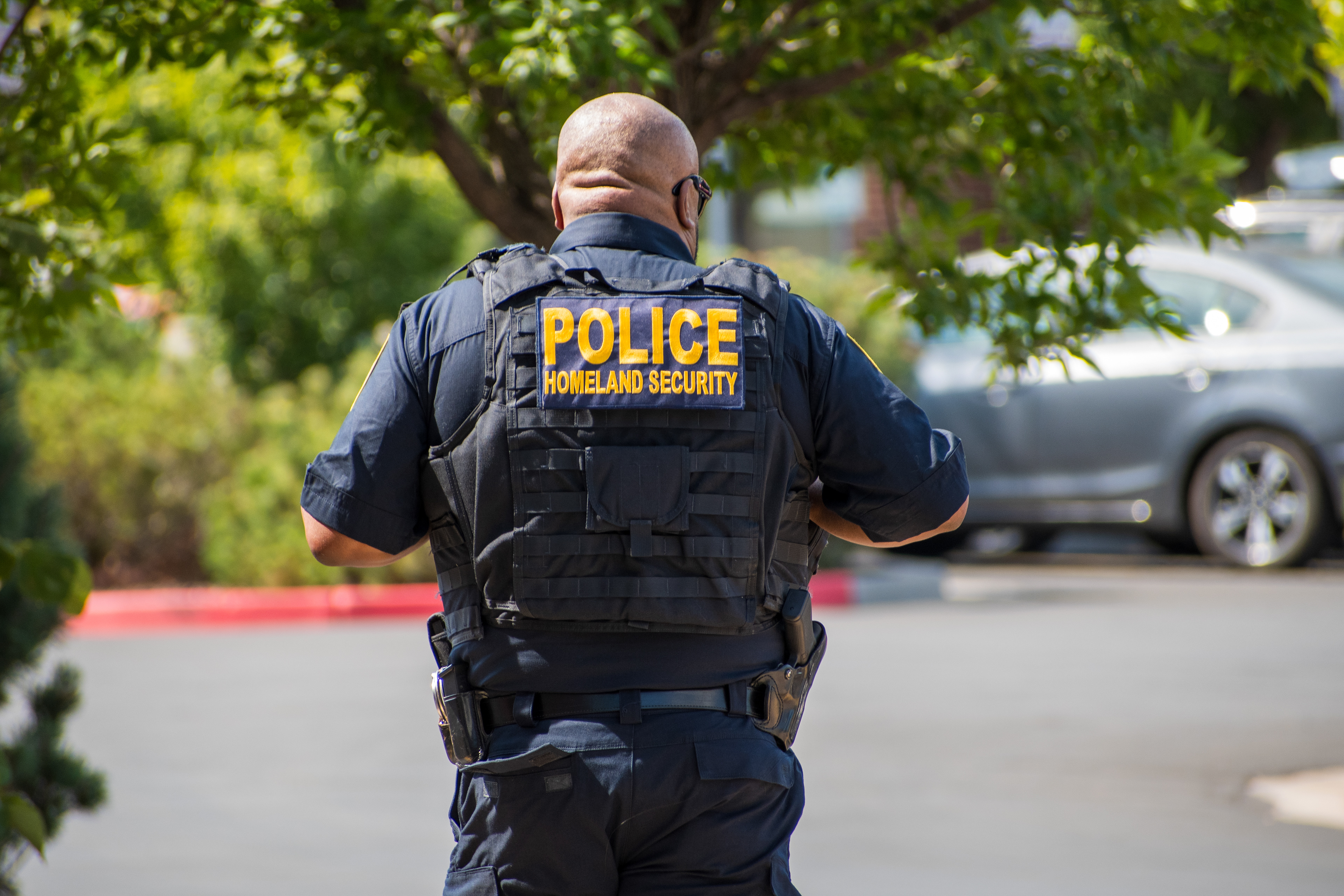September 15, 2025 – Provo, Utah, United States: Two Homeland Security police officers walk through a parking lot near the Utah Valley Convention Center during a Department of Homeland Security career expo focused on recruiting law enforcement and security personnel. Photograph by Charles‑McClintock Wilson / ZUMA Press Wire