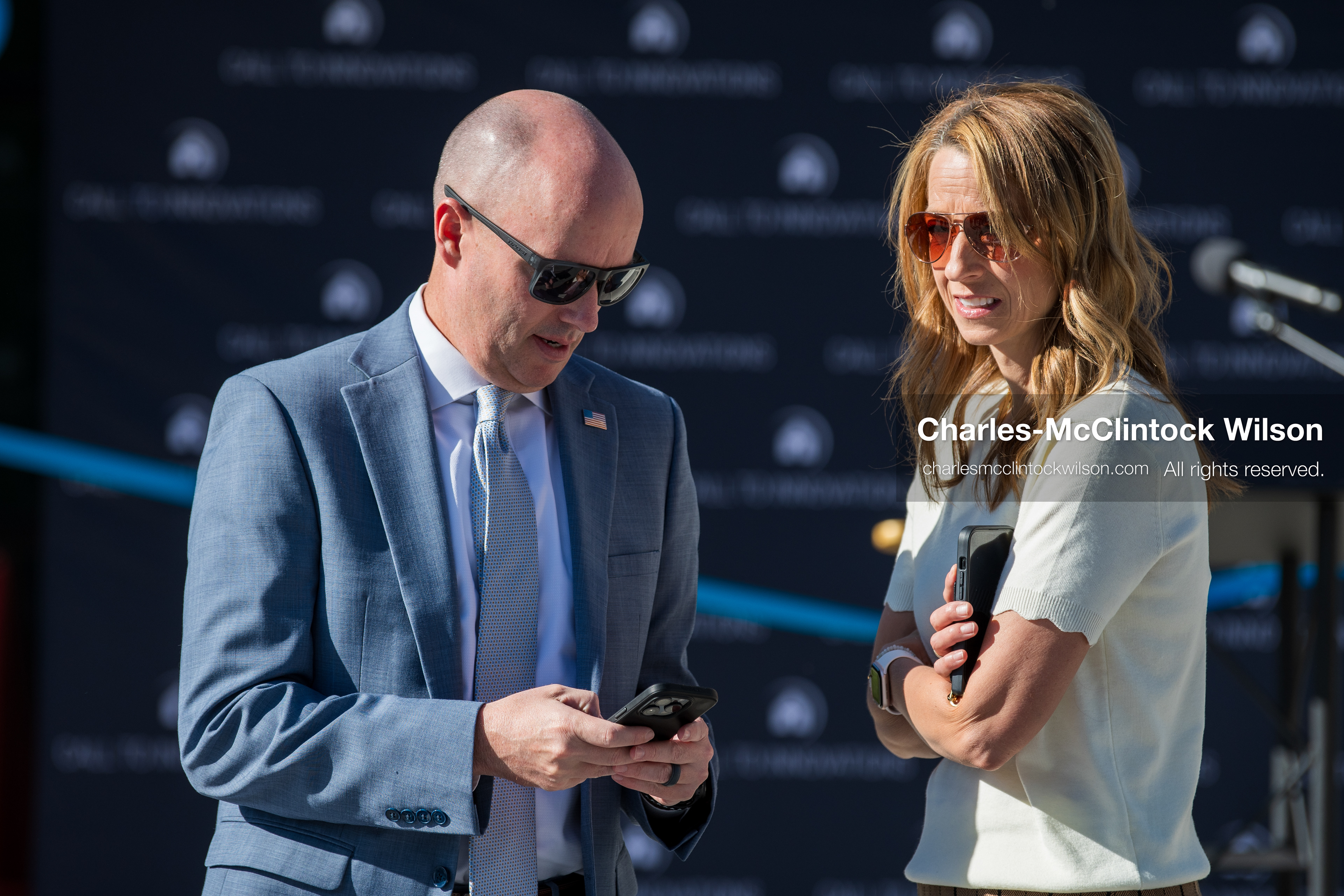 May 28, 2026, Lehi, Utah, USA: Utah Governor SPENCER COX and First Lady ABBY COX confer before the start of the opening ceremony for Innovation Park at Holbrook Farms and the Lehi Rippy Literacy Center on May 28, 2026, in Lehi, Utah. (Credit Image: © Charles‑McClintock Wilson/ZUMA Press Wire)