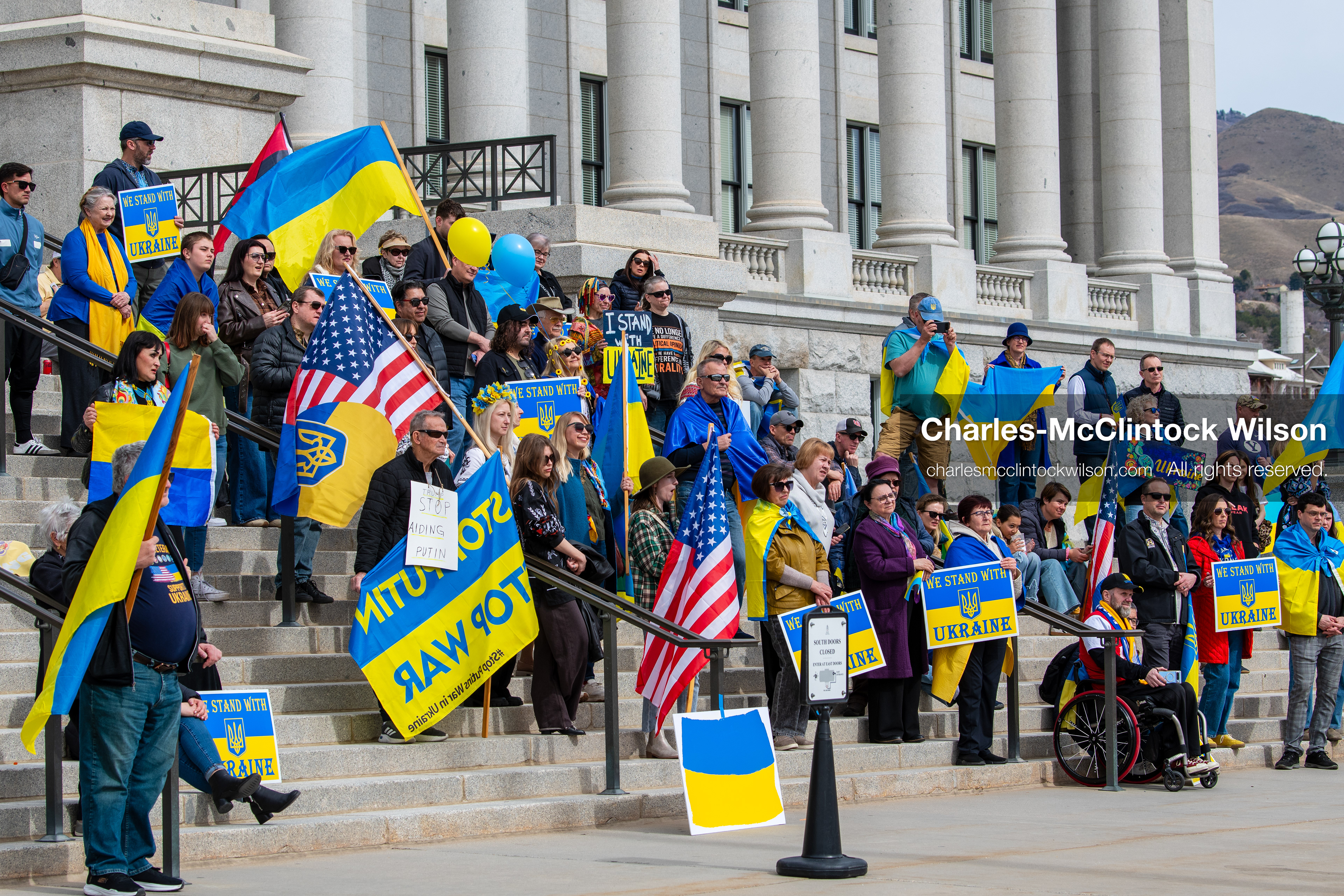 February 28, 2026, Salt Lake City, Utah, USA: Supporters gather on the steps of the Utah State Capitol during the Stand With Ukraine rally marking the four year anniversary of the full scale Russian invasion of Ukraine. Participants hold signs and Ukrainian flags as community members call for continued support for Ukraine and an end to the war. (Credit Image: © Charles McClintock Wilson/ZUMA Press Wire)