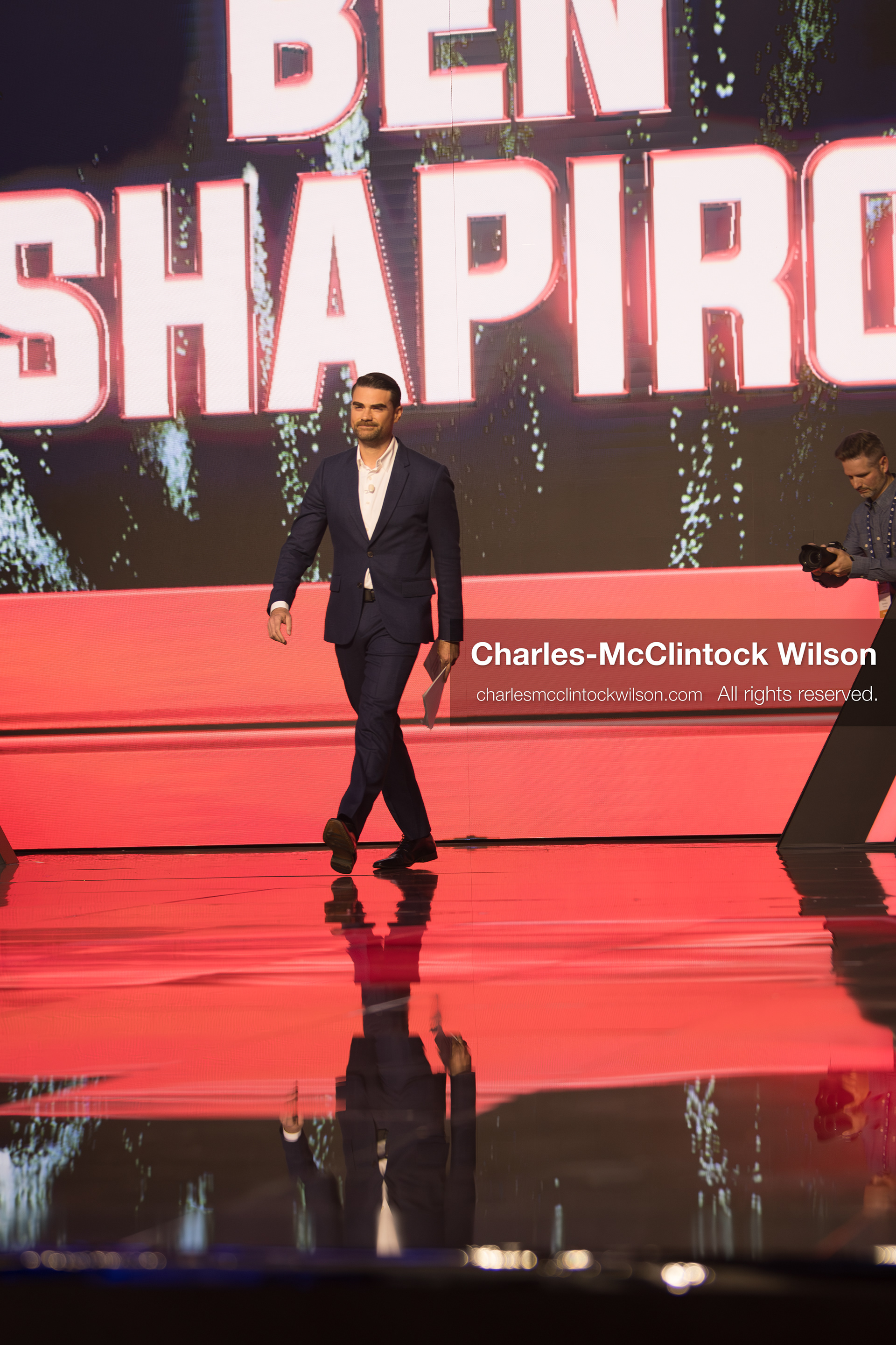 December 18, 2025, Phoenix, Arizona, USA: Ben Shapiro walks toward the stage during Day One of Turning Point USA’s AmericaFest 2025 at the Phoenix Convention Center in Phoenix, Arizona.