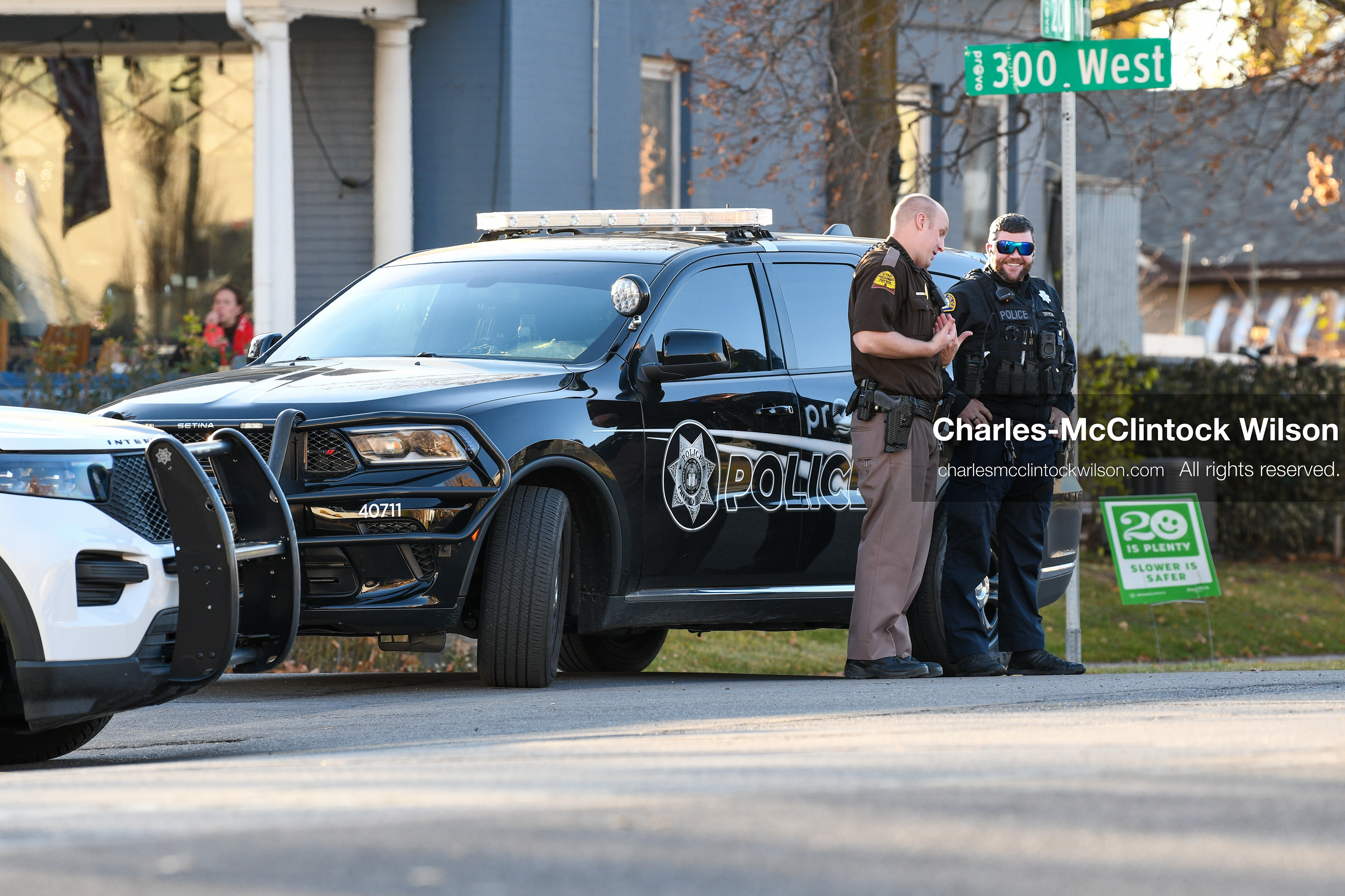 PROVO, UTAH, USA – DECEMBER 11, 2025: A Provo Police officer and a Utah Highway Patrol trooper stand outside the Fourth District Court in Provo during the first in‑person court appearance of Tyler Robinson in the Charlie Kirk murder case. (Credit Image: © Charles‑McClintock Wilson/ZUMA Press Wire)