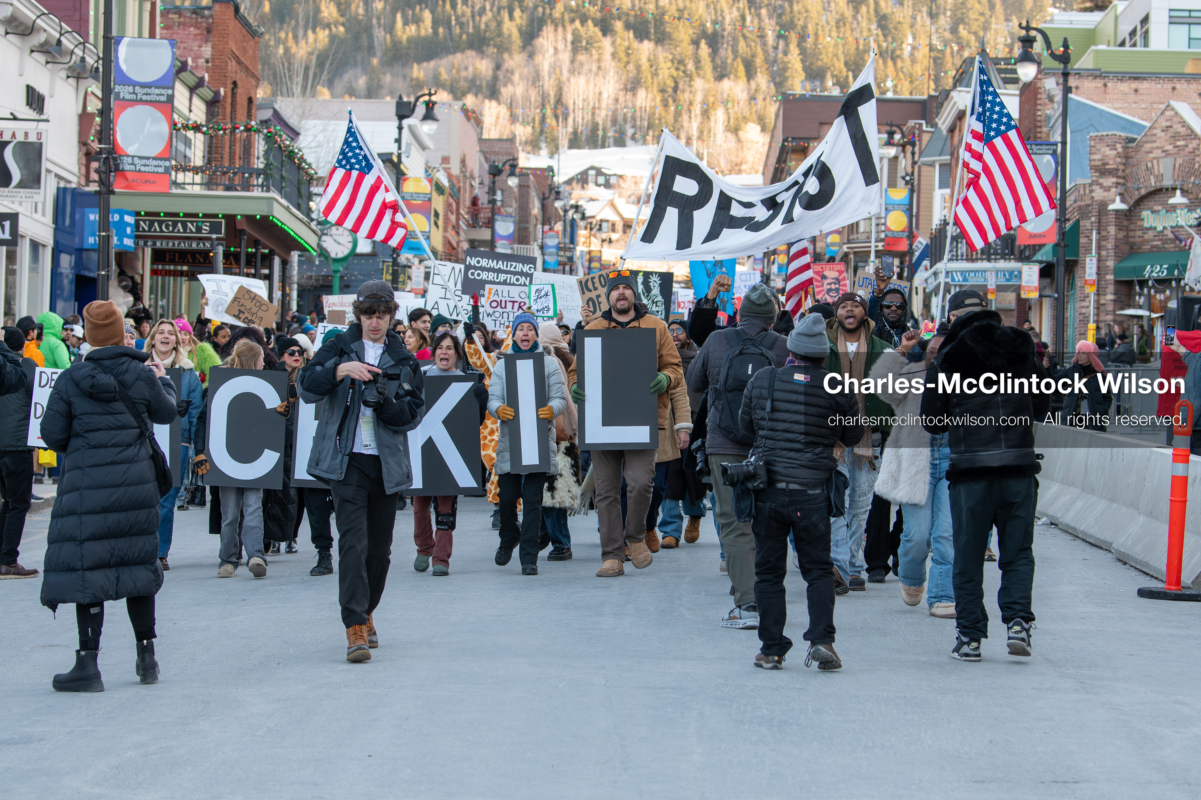 January 26, 2026, Park City, Utah, USA: Demonstrators march through Main Street holding signs during a protest opposing U.S. Immigration and Customs Enforcement (I.C.E.) ICE agents at the Sundance Film Festival in Park City, Utah, on Monday, Jan. 26, 2026. The event was held in response to the fatal shooting of Alex Pretti by a U.S. Border Patrol officer in Minneapolis. (Credit Image: © Charles McClintock Wilson/ZUMA Press Wire)