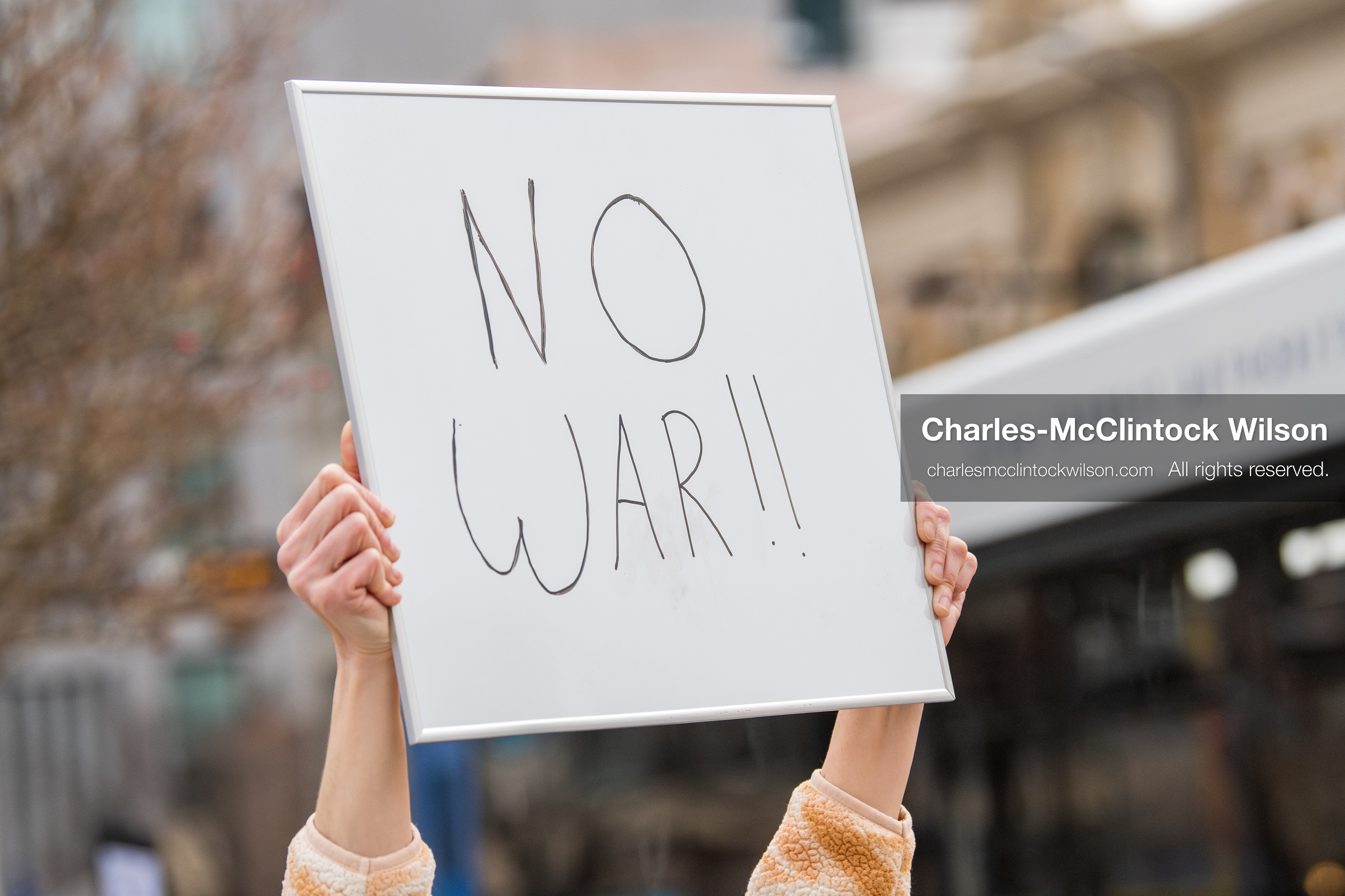 January 3, 2026, Salt Lake City, Utah, USA: A protester holds a sign during a demonstration against US action in Venezuela outside the Wallace Federal Building in Salt Lake City, Utah. The protest was part of a nationwide mobilization responding to recent military developments. (Credit Image: (c) Charles‑McClintock Wilson/ZUMA Press Wire)