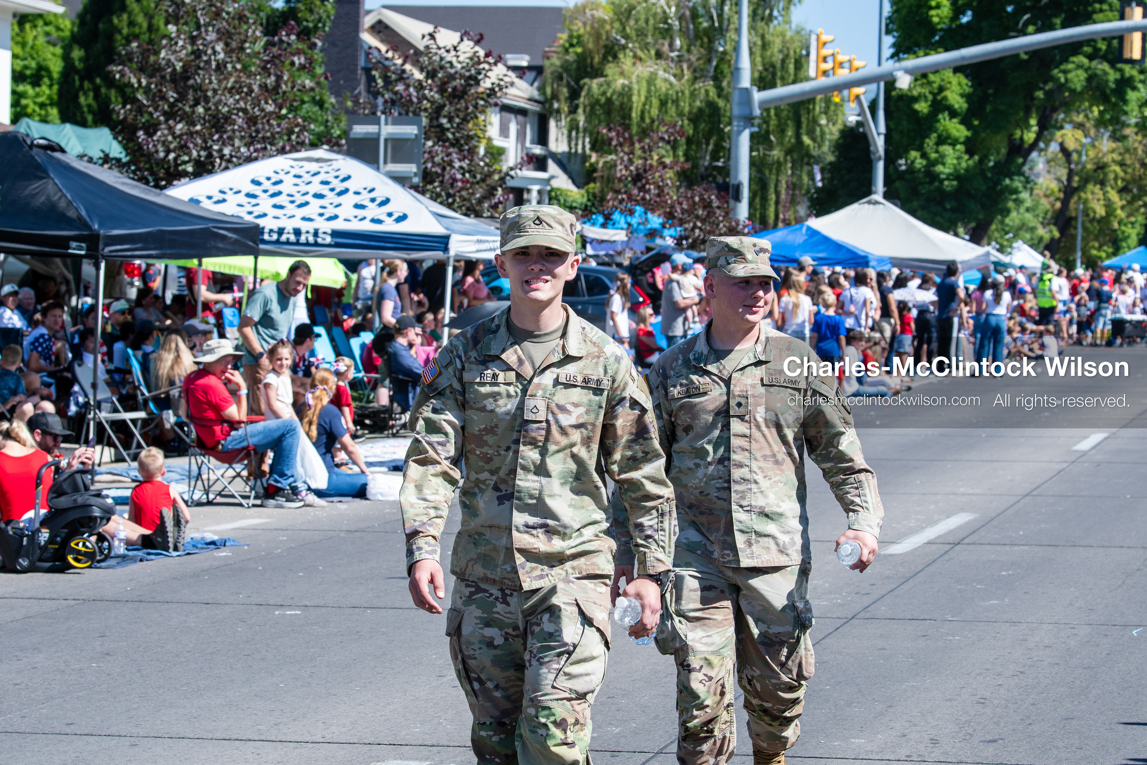 July 4, 2026, Provo, Utah, USA: Military service members in uniform march down the street past spectators during America's Freedom Festival Grand Parade in Provo, Utah, Saturday, July 4, 2026. The annual event drew thousands of spectators to the downtown corridor. (Credit Image: © Charles-McClintock Wilson/ZUMA Press Wire)