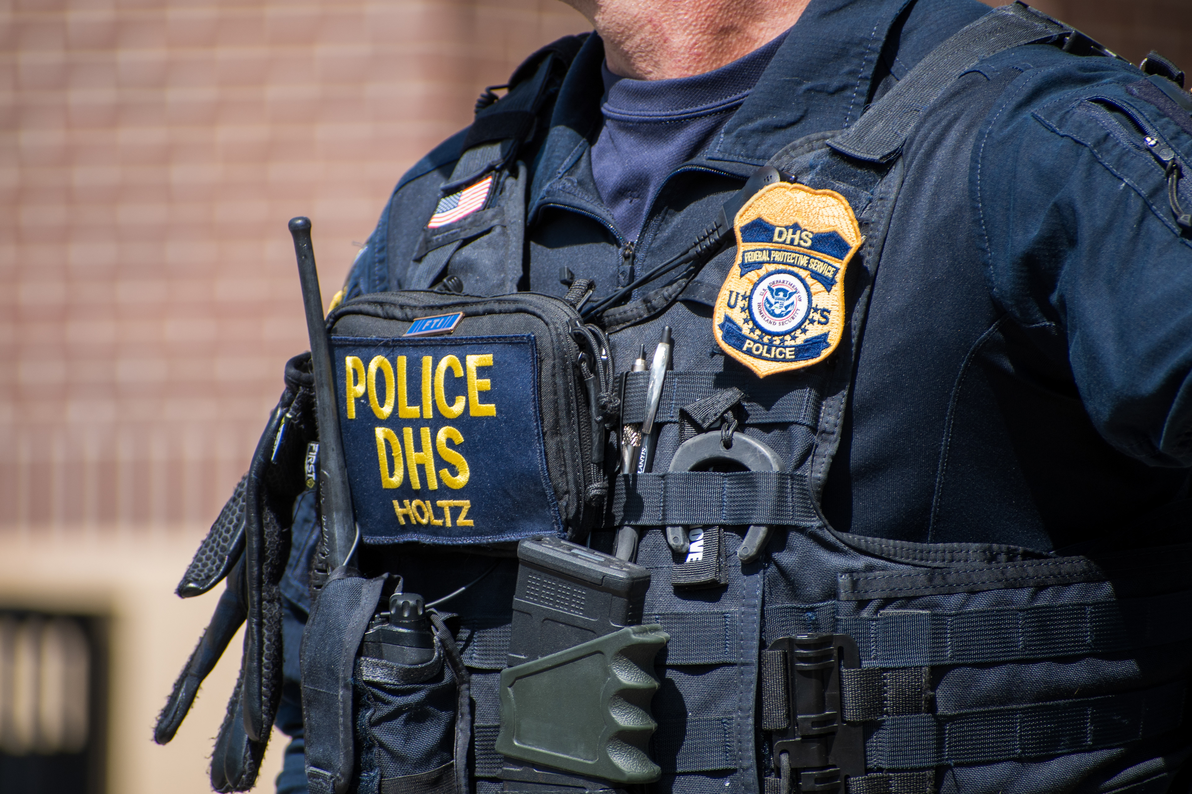 September 15, 2025 – Provo, Utah, United States: A Homeland Security police officer stands outside the Utah Valley Convention Center during a Department of Homeland Security career expo focused on recruiting law enforcement and security personnel. Photograph by Charles‑McClintock Wilson / ZUMA Press Wire