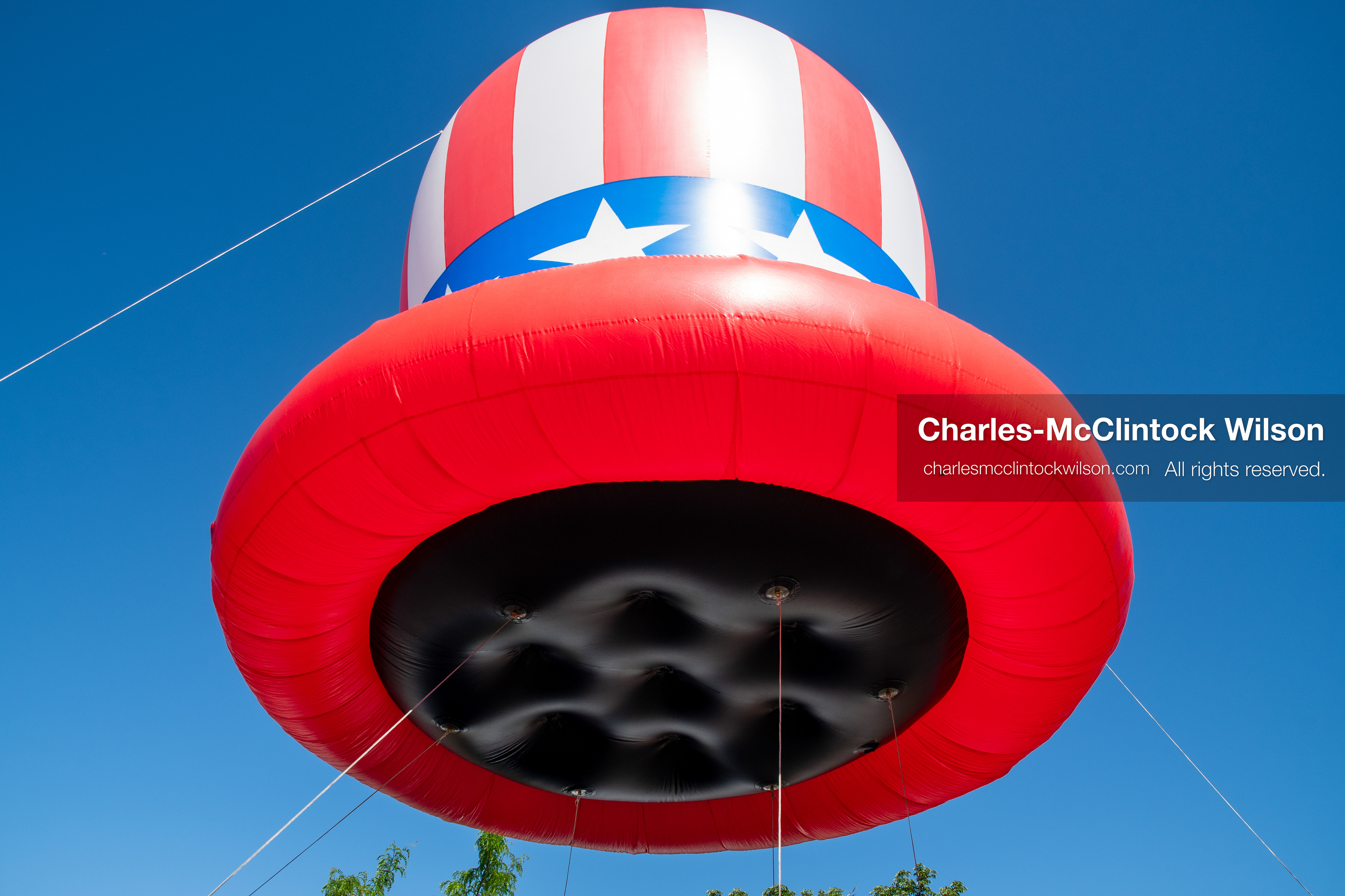 July 4, 2026, Provo, Utah, USA: A giant, patriotic Uncle Sam style top hat helium balloon floats against a clear blue sky during America's Freedom Festival Grand Parade in Provo, Utah, Saturday, July 4, 2026. The annual Independence Day event features expanded programming to honor the 250th anniversary of United States independence. (Credit Image: © Charles-McClintock Wilson/ZUMA Press Wire)