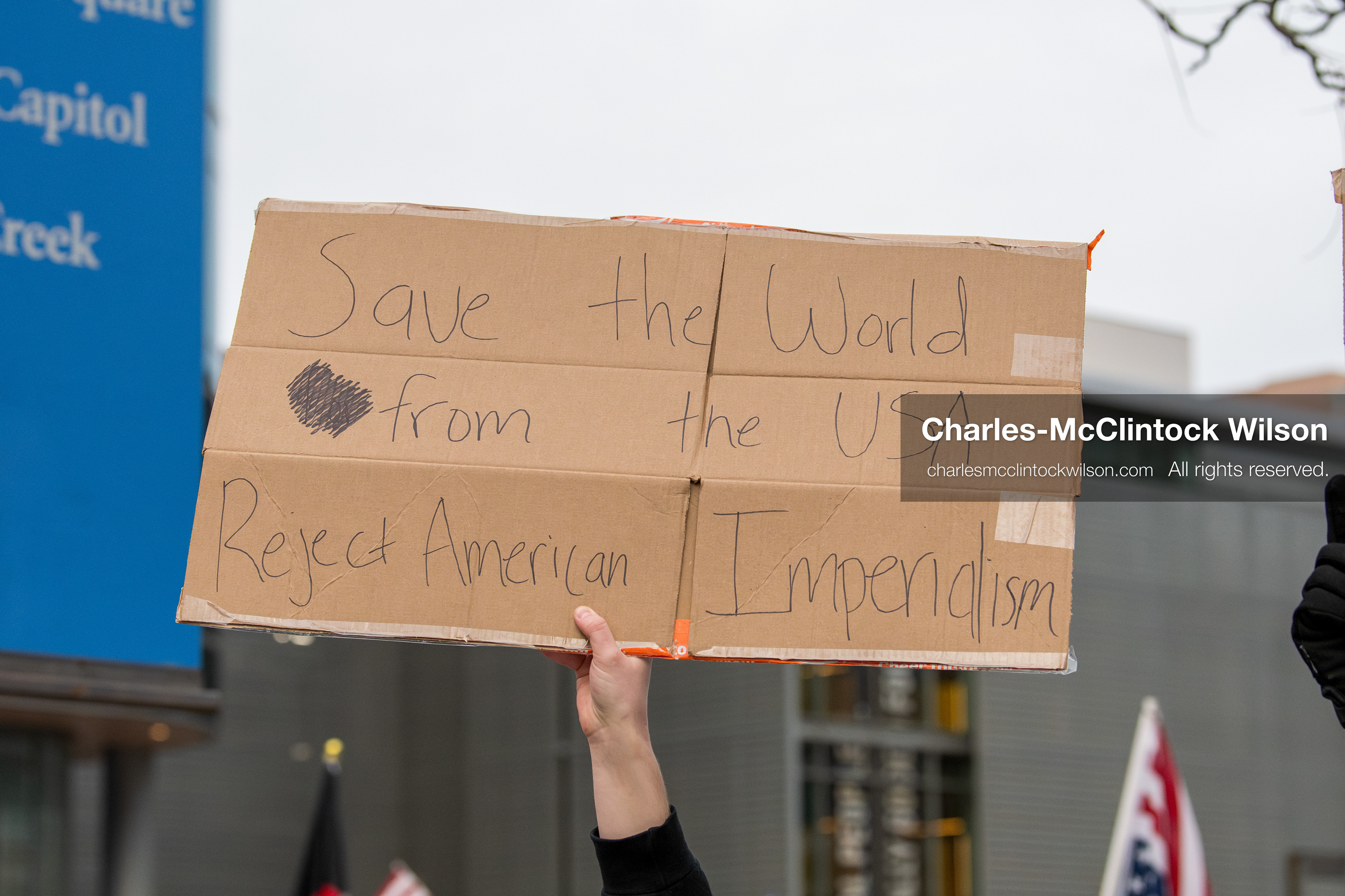 January 3, 2026, Salt Lake City, Utah, USA: A protester holds a sign during a demonstration against US action in Venezuela outside the Wallace Federal Building in Salt Lake City, Utah. The protest was part of a nationwide mobilization responding to recent military developments. (Credit Image: (c) Charles‑McClintock Wilson/ZUMA Press Wire)