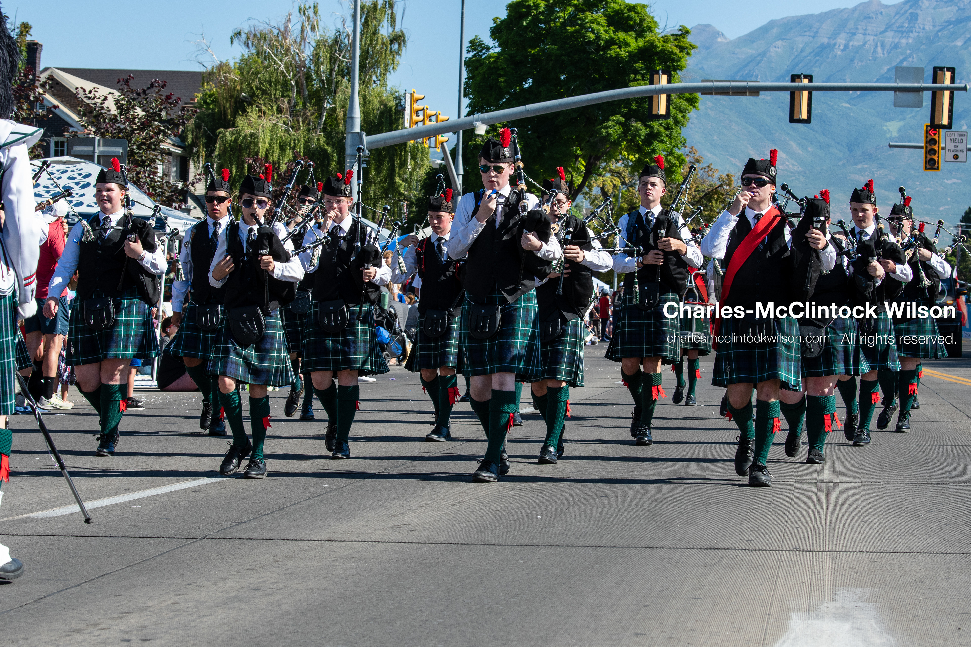 July 4, 2026, Provo, Utah, USA: Members of a pipe and drum band dressed in traditional Scottish kilts march down the street while playing bagpipes during America's Freedom Festival Grand Parade in Provo, Utah, Saturday, July 4, 2026. The annual Independence Day event features expanded programming to honor the 250th anniversary of United States independence. (Credit Image: © Charles-McClintock Wilson/ZUMA Press Wire)