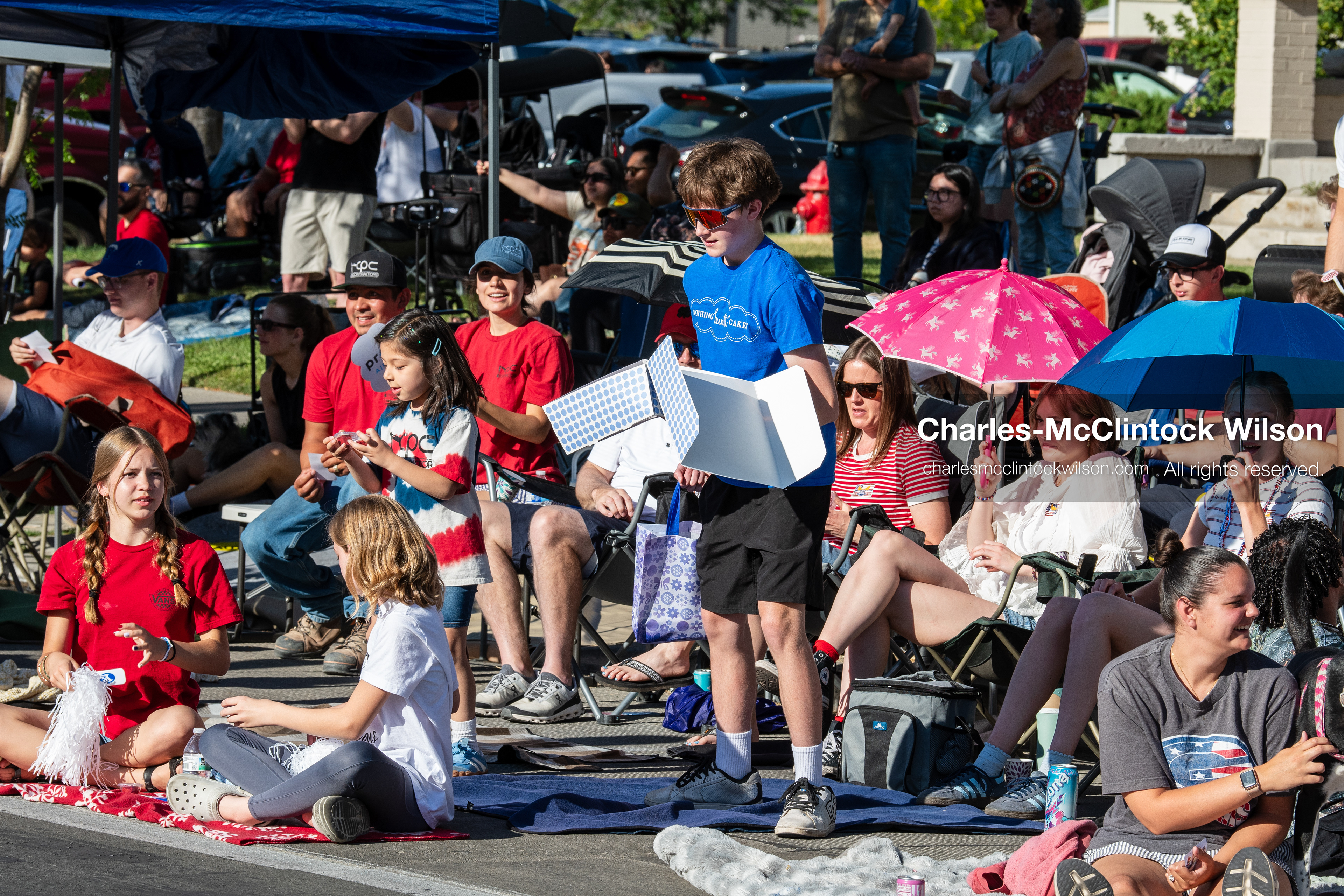 July 4, 2026, Provo, Utah, USA: Spectators and children gather along the sidewalk to watch America's Freedom Festival Grand Parade in Provo, Utah, Saturday, July 4, 2026. The annual Independence Day event features expanded programming to honor the 250th anniversary of United States independence. (Credit Image: © Charles-McClintock Wilson/ZUMA Press Wire)