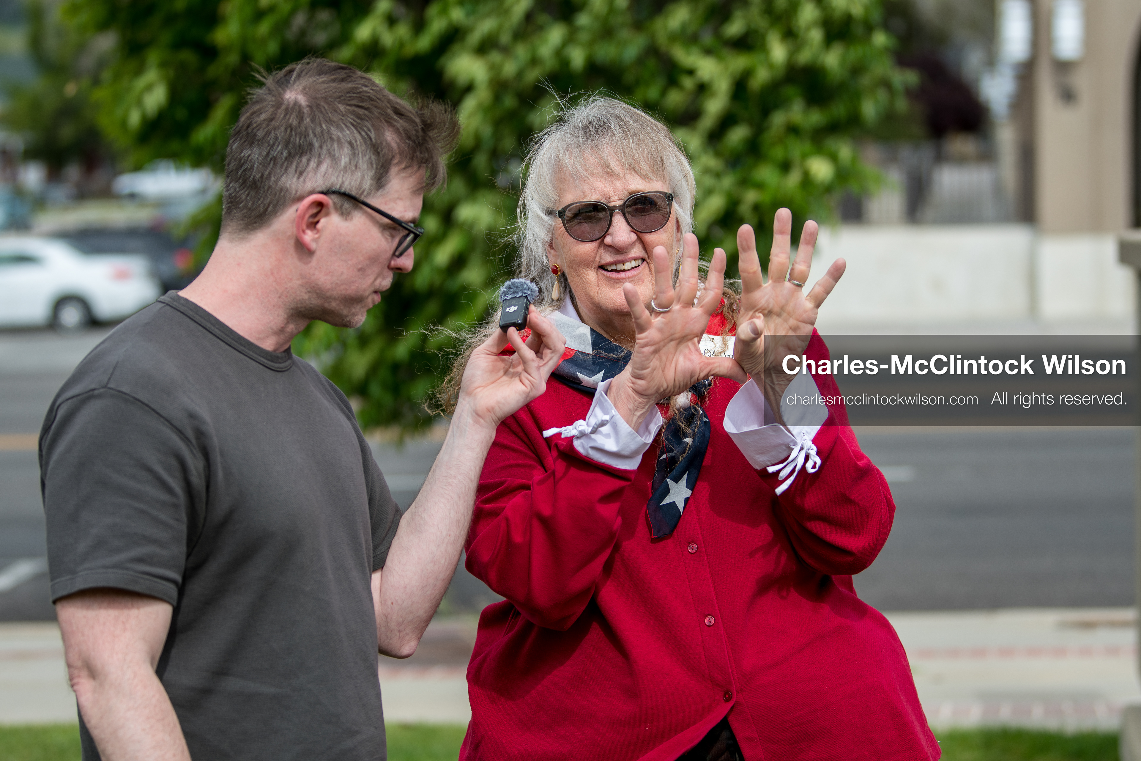 May 13, 2026, Brigham City, Utah, USA: US political satirist and digital creator WALTER MASTERSON interviews Julie Quinlan, a political candidate running for election to the Utah State Senate to represent District 1, outside the Box Elder County Justice Courthouse in Brigham City, Utah, during a gathering over the proposed data‑center project backed by businessman Kevin O’Leary, which has drawn public concern over water use, power demand, and transparency. (Credit Image: © Charles‑McClintock Wilson/ZUMA Press Wire)