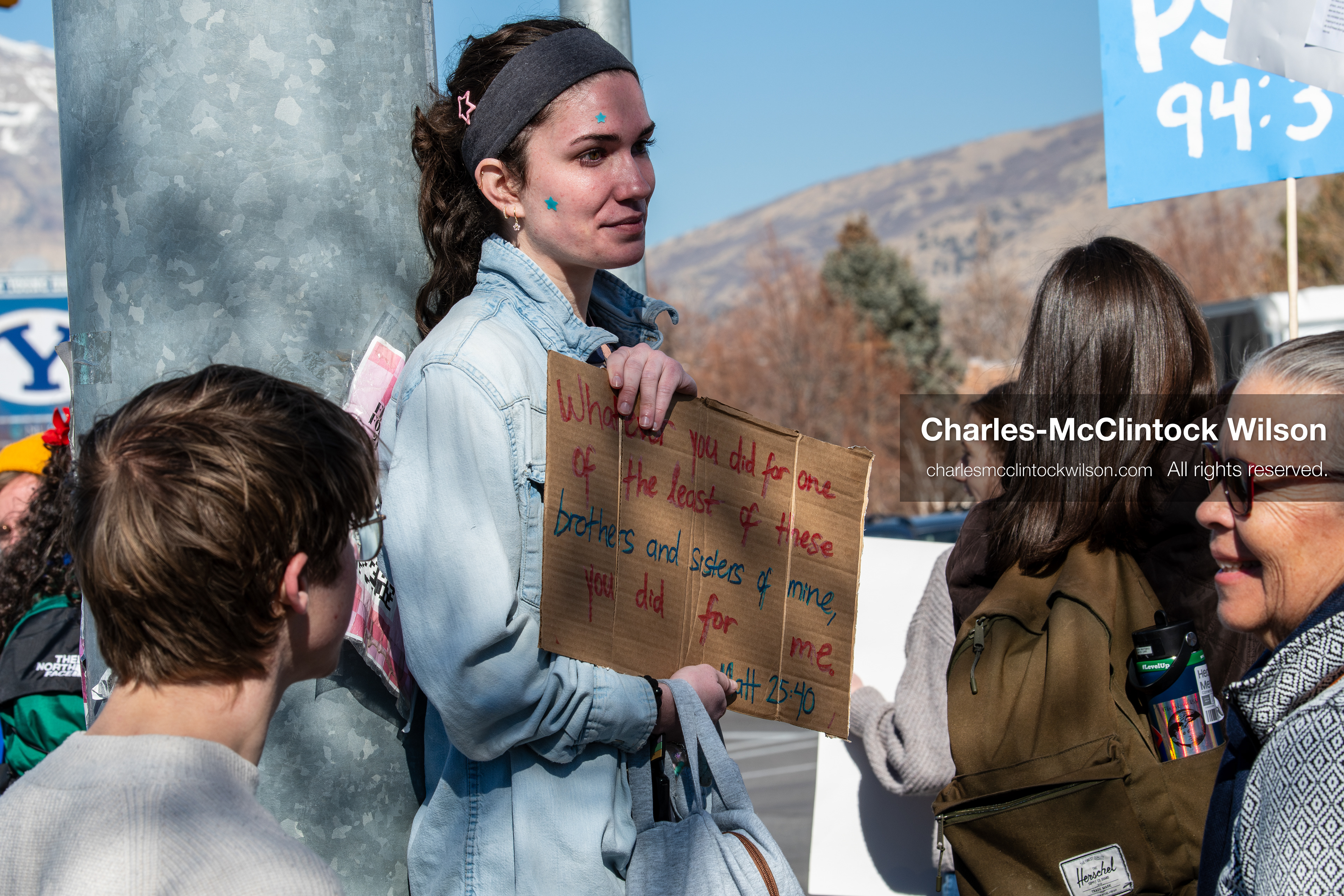 February 5, 2026, Provo, Utah, USA: A demonstrator holds a sign during a gathering near Brigham Young University in Provo where students and community members protested the presence of US Customs and Border Protection recruiters at a career fair held on the BYU campus. (Credit Image: © Charles McClintock Wilson/ZUMA Press Wire)