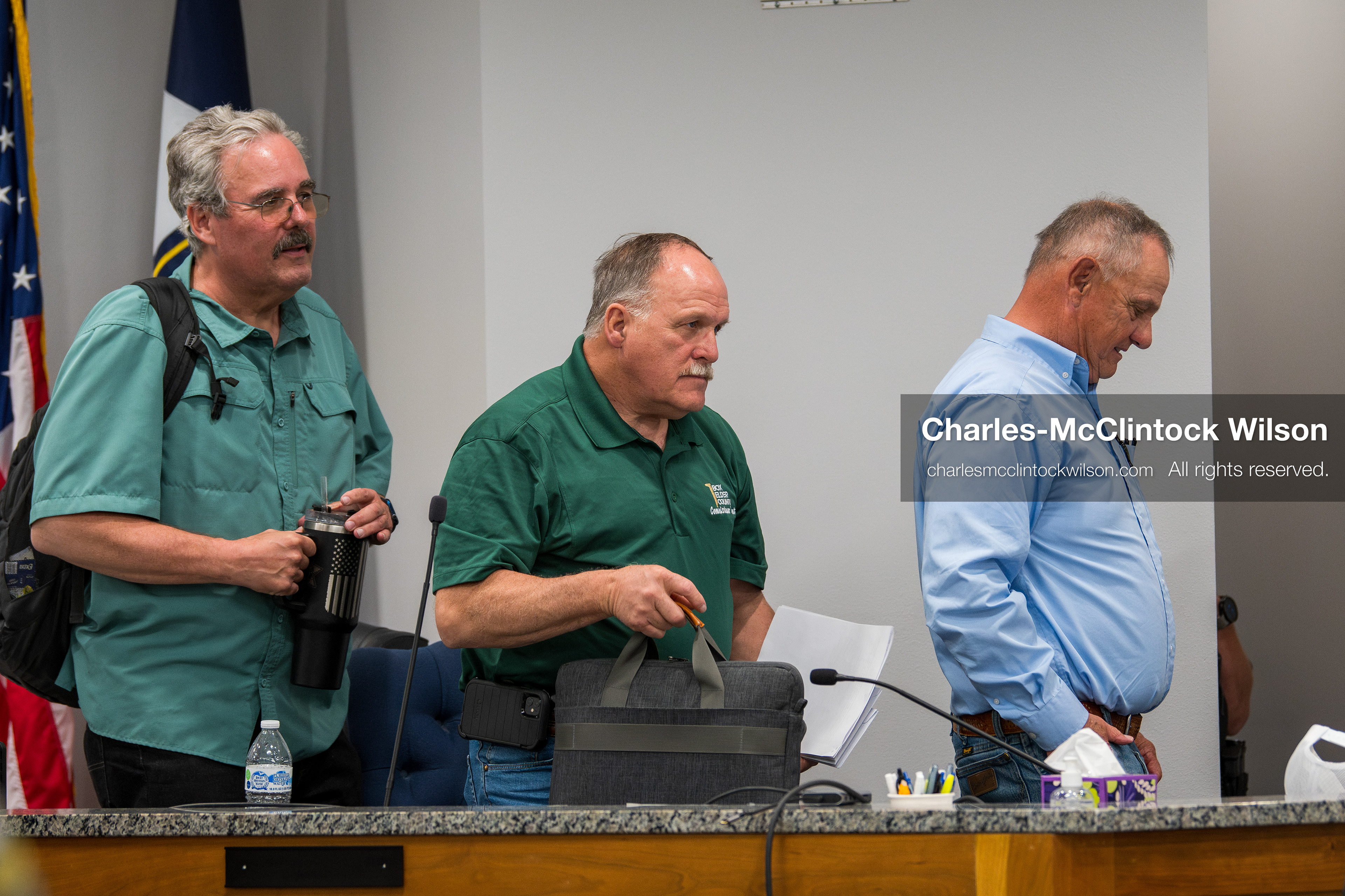 May 13, 2026, Brigham City, Utah, USA: Box Elder County Commissioners, from left to right, LEE PERRY, TYLER VINCENT, and BOYD BRIGHAM, gather their materials following the Box Elder County Commission meeting inside the Box Elder County Justice Center in Brigham City, Utah. The meeting addressed the proposed data‑center project backed by businessman Kevin O’Leary, which has drawn public concern over water use, power demand, and transparency. (Credit Image: © Charles‑McClintock Wilson/ZUMA Press Wire)