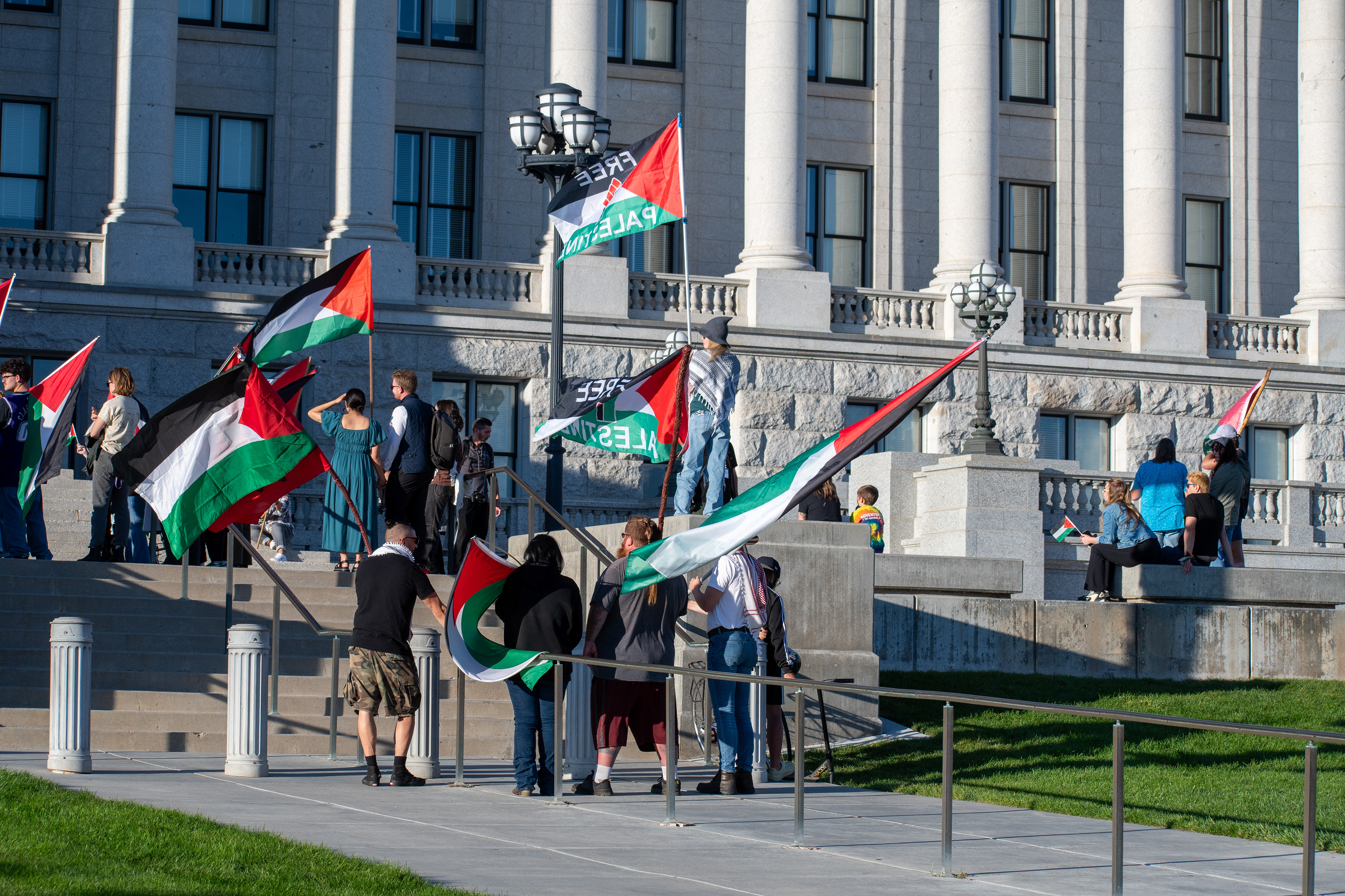 October 10, 2025, Salt Lake City, Utah, USA: Pro-Palestine demonstrators gather in front of the Utah State Capitol during the Free Palestine Rally. Participants hold flags and signs as part of the public demonstration. (Credit Image: © Charles-McClintock Wilson/ZUMA Press Wire)